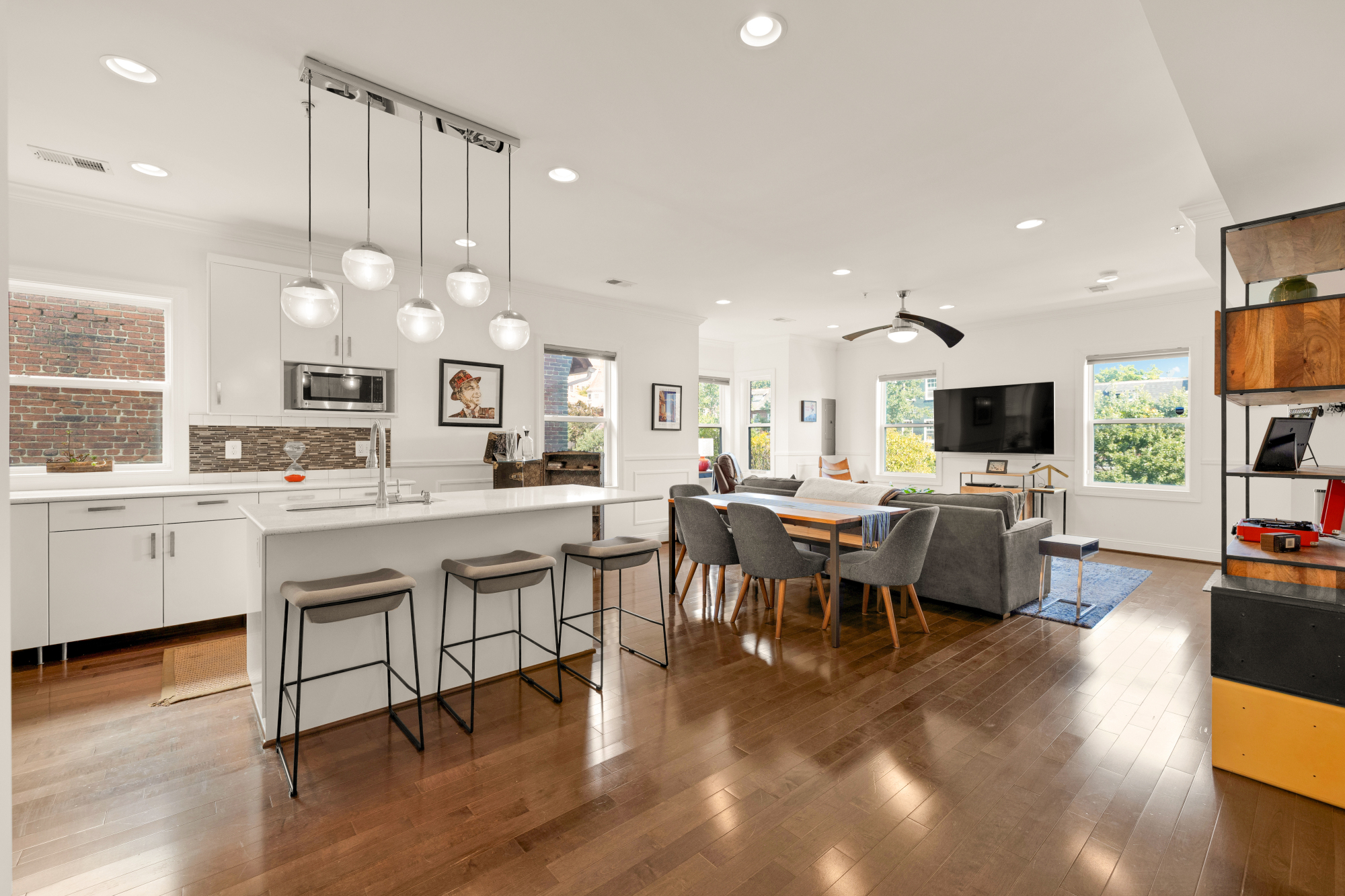 233 S Street Northeast, Unit 4 Washington, DC 20002 - Photo 13 of 37 a large kitchen with a table and chairs