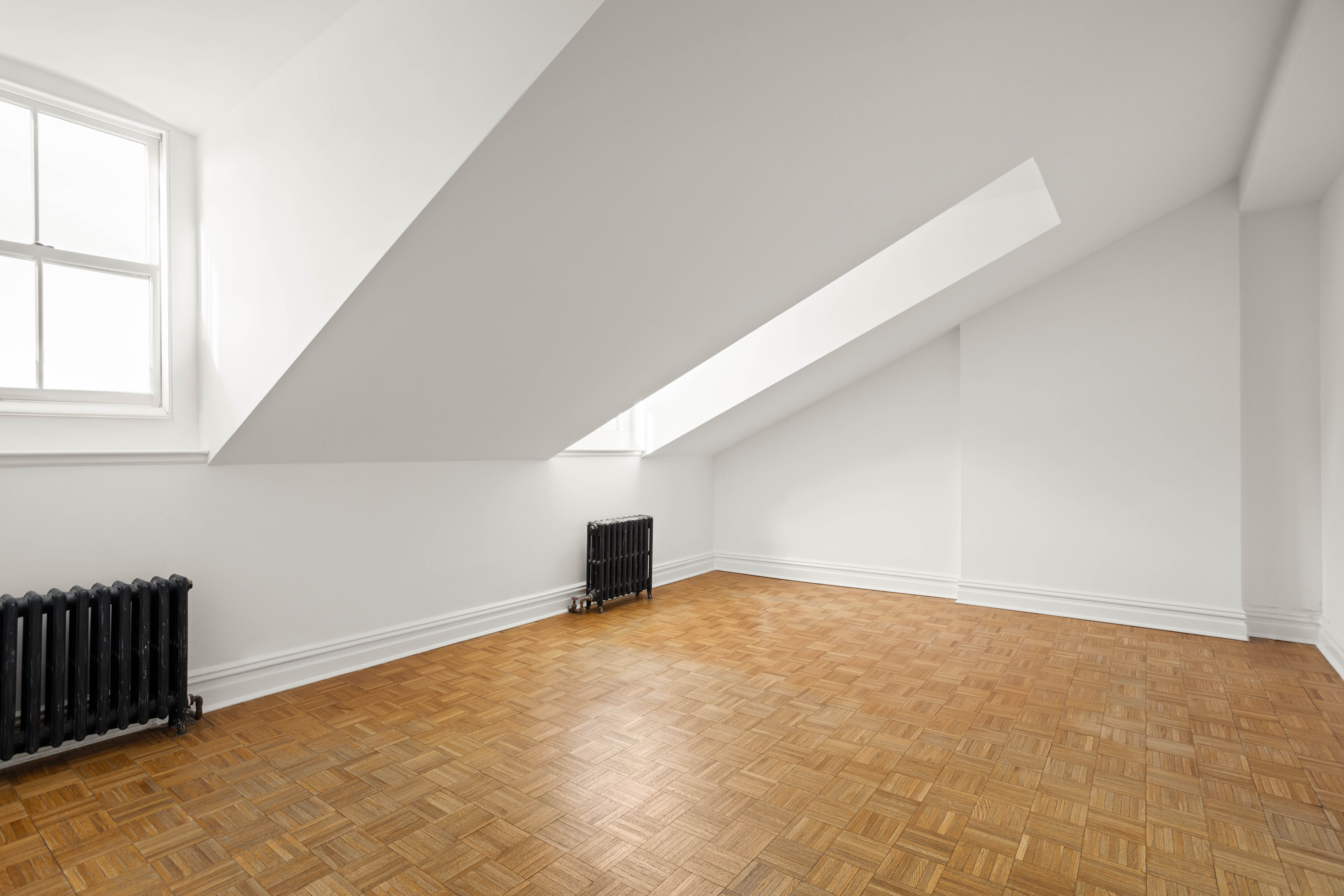 357 West 20th Street, Unit B Manhattan, NY 10011 - Photo 6 of 10 a view of an empty room with a window