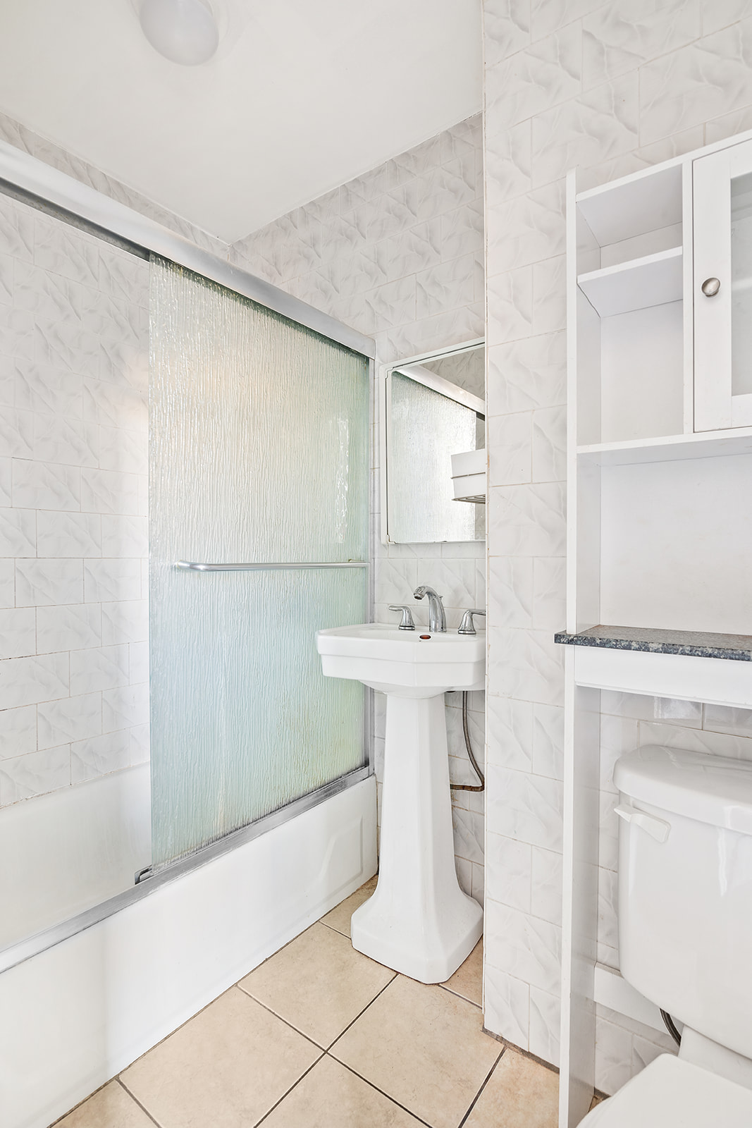 418 South 4th Street, Unit 2R Brooklyn, NY 11211 - Photo 6 of 6 a bathroom with a sink and mirror