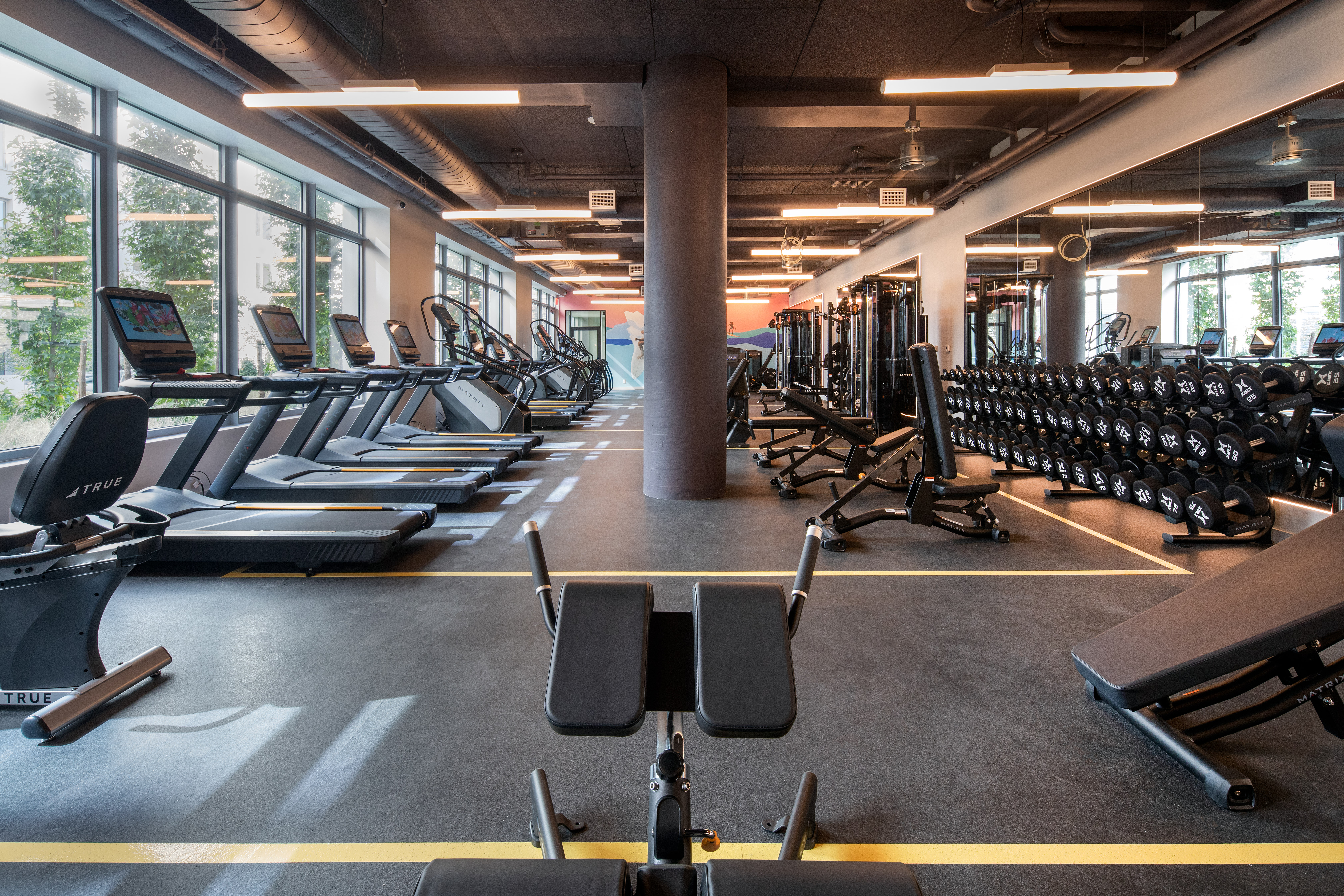 30-77 Vernon Boulevard, Unit 409E Queens, NY 11102 - Photo 10 of 21 a room with gym equipment