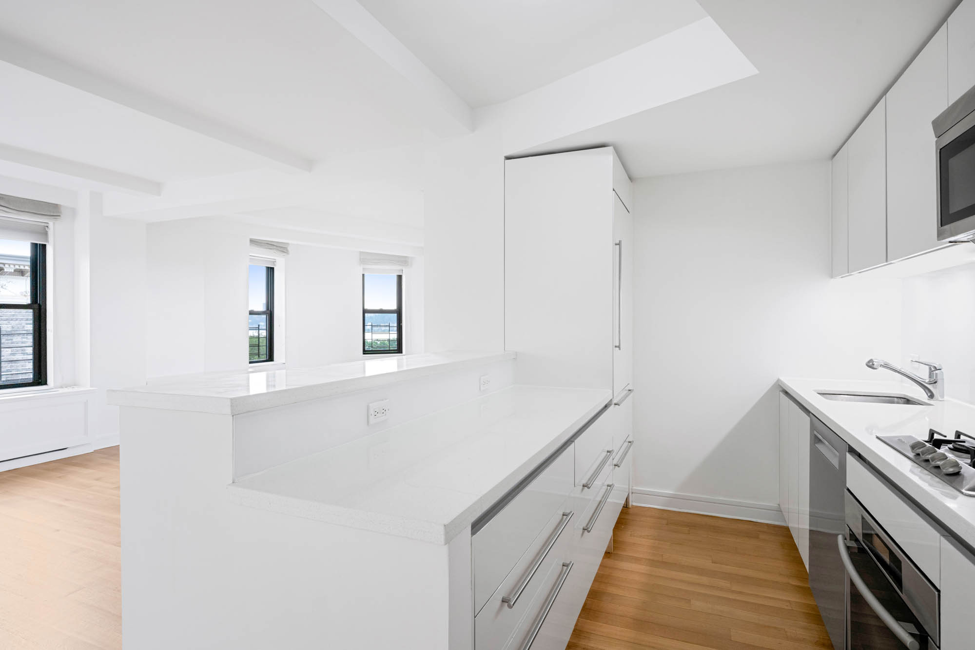 230 Riverside Drive, Unit 8D Manhattan, NY 10025 - Photo 3 of 19 a spacious bathroom with a sink and a mirror