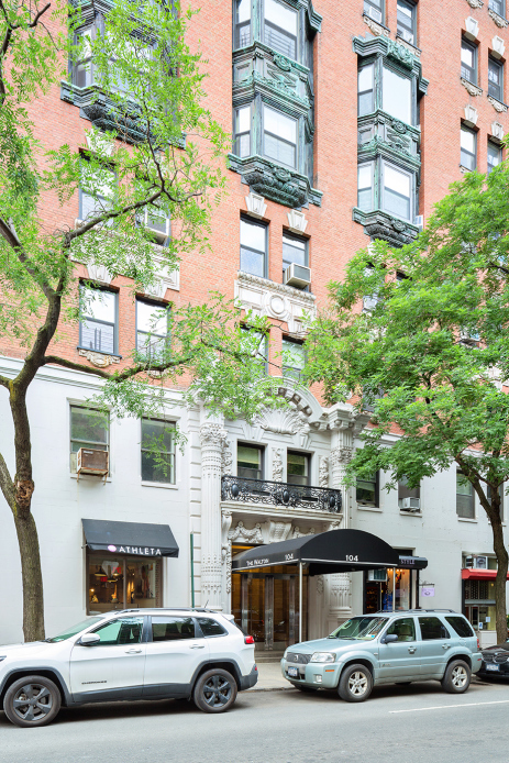 104 West 70th Street, Unit 7D Manhattan, NY 10023 - Photo 2 of 2 a car parked in front of a building