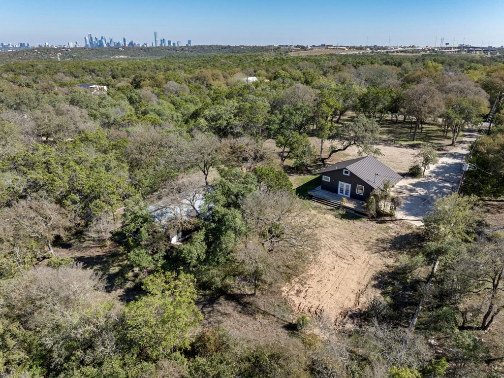 4416 Stearn's Lane Austin, TX 78735 - Photo 8 of 32 an aerial view of a houses with a yard