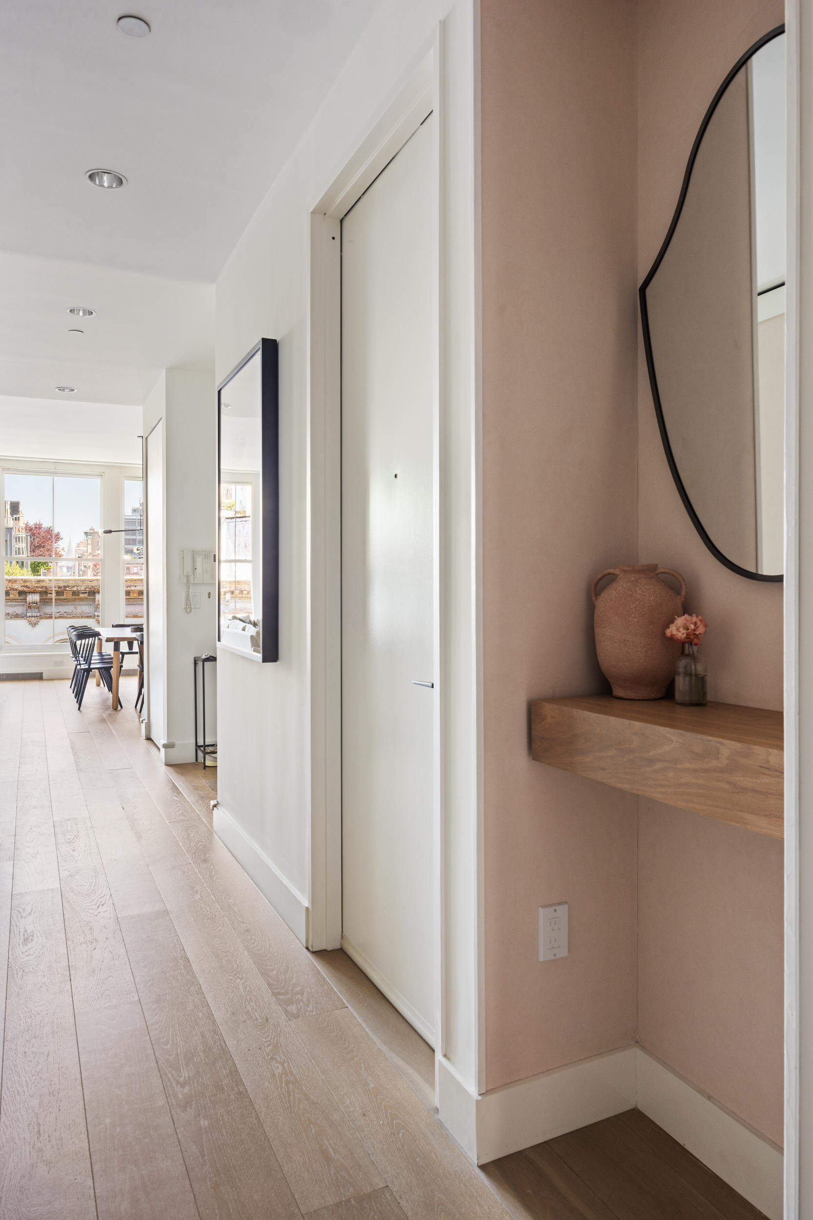 51 Walker Street, Unit 8B Manhattan, NY 10013 - Photo 13 of 16 a view of a room with wooden floor and furniture