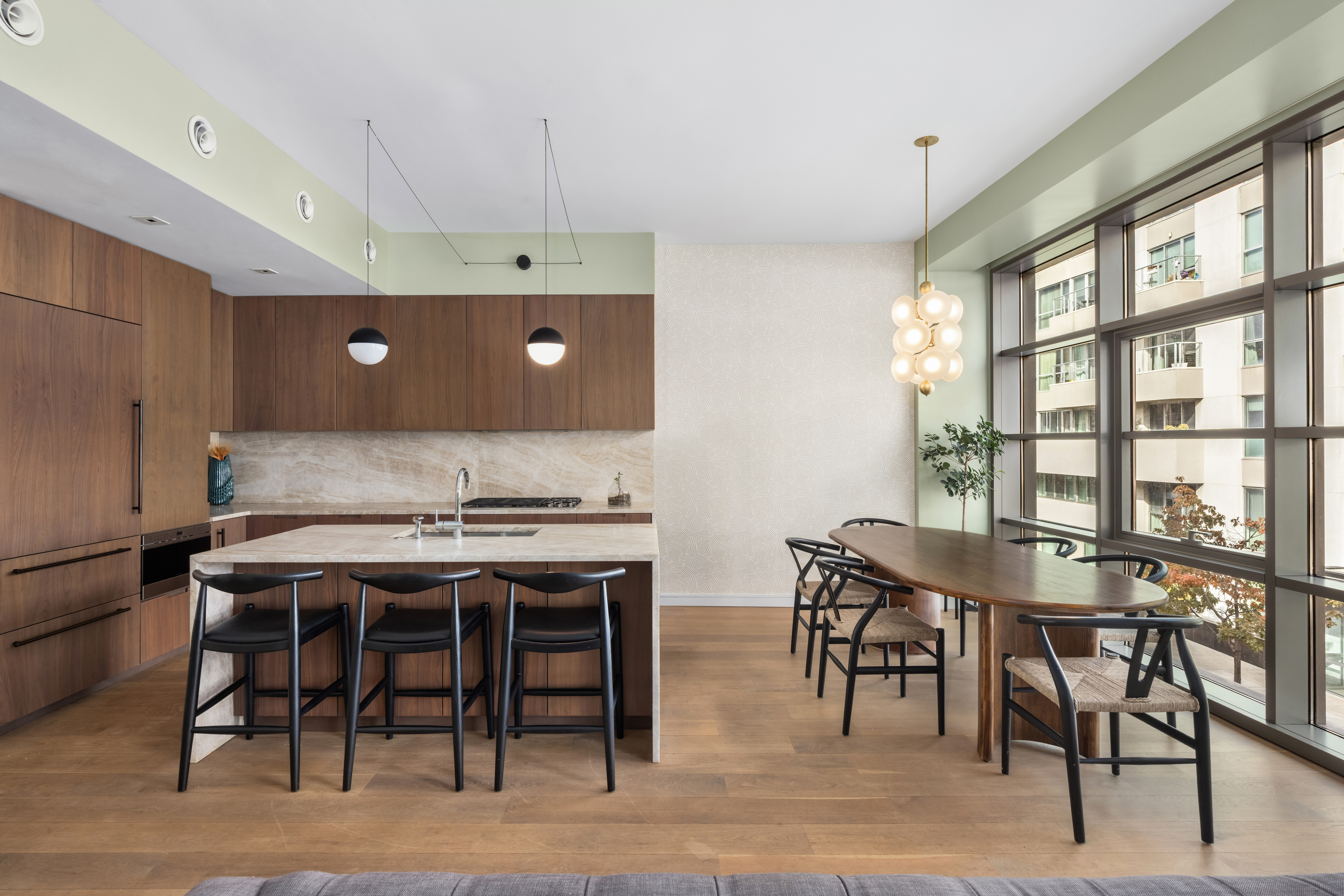 138 North 10th Street, Unit 302 Brooklyn, NY 11249 - Photo 5 of 15 a view of a dining room with furniture