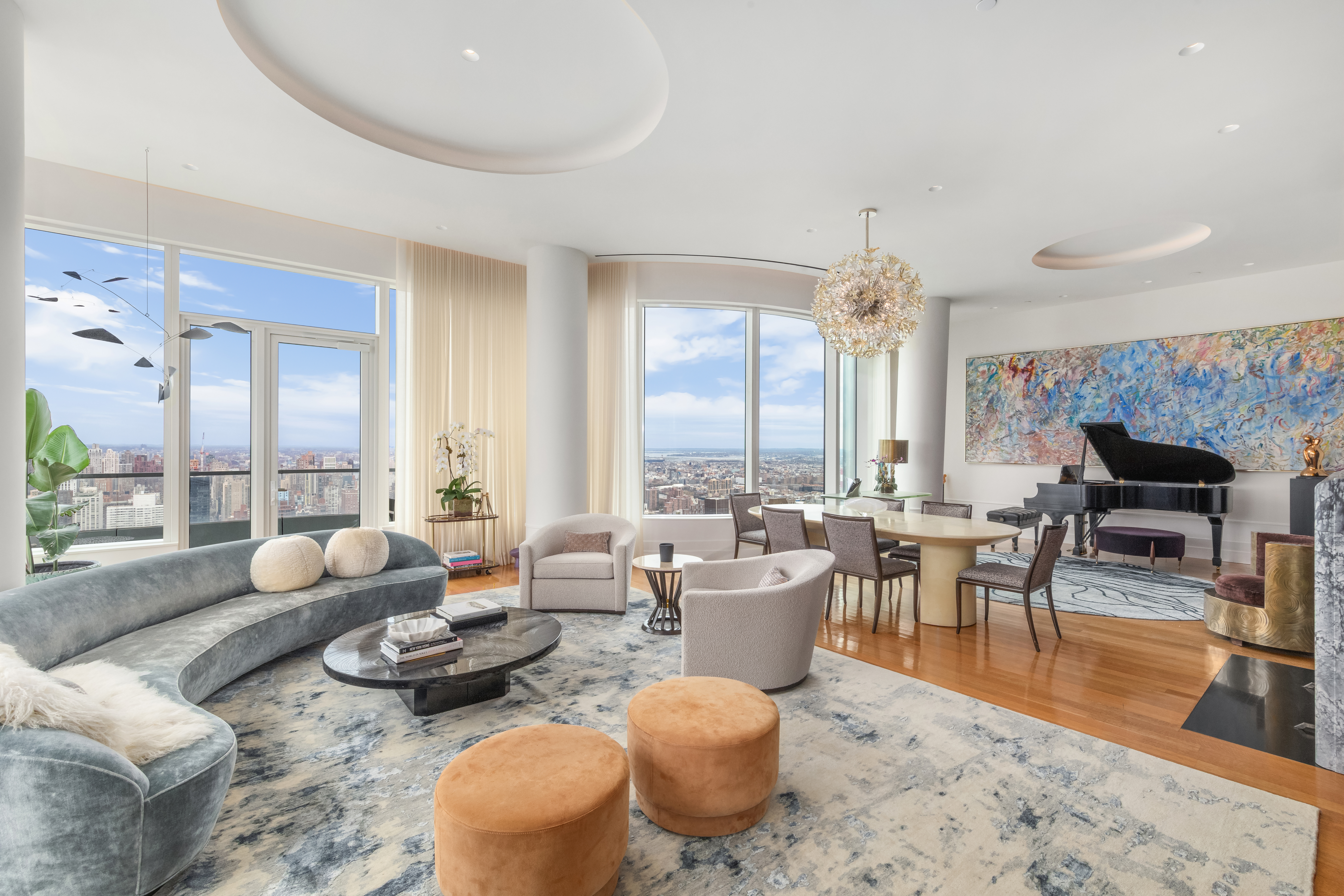 252 East 57th Street, Unit 60A Manhattan, NY 10022 - Photo 4 of 28 a living room with furniture and a large window