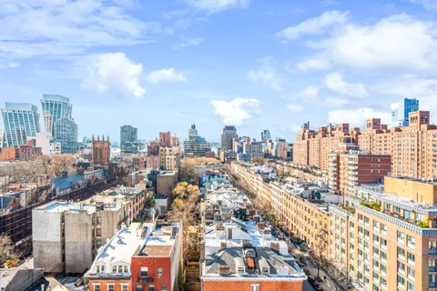 a view of a city with tall buildings