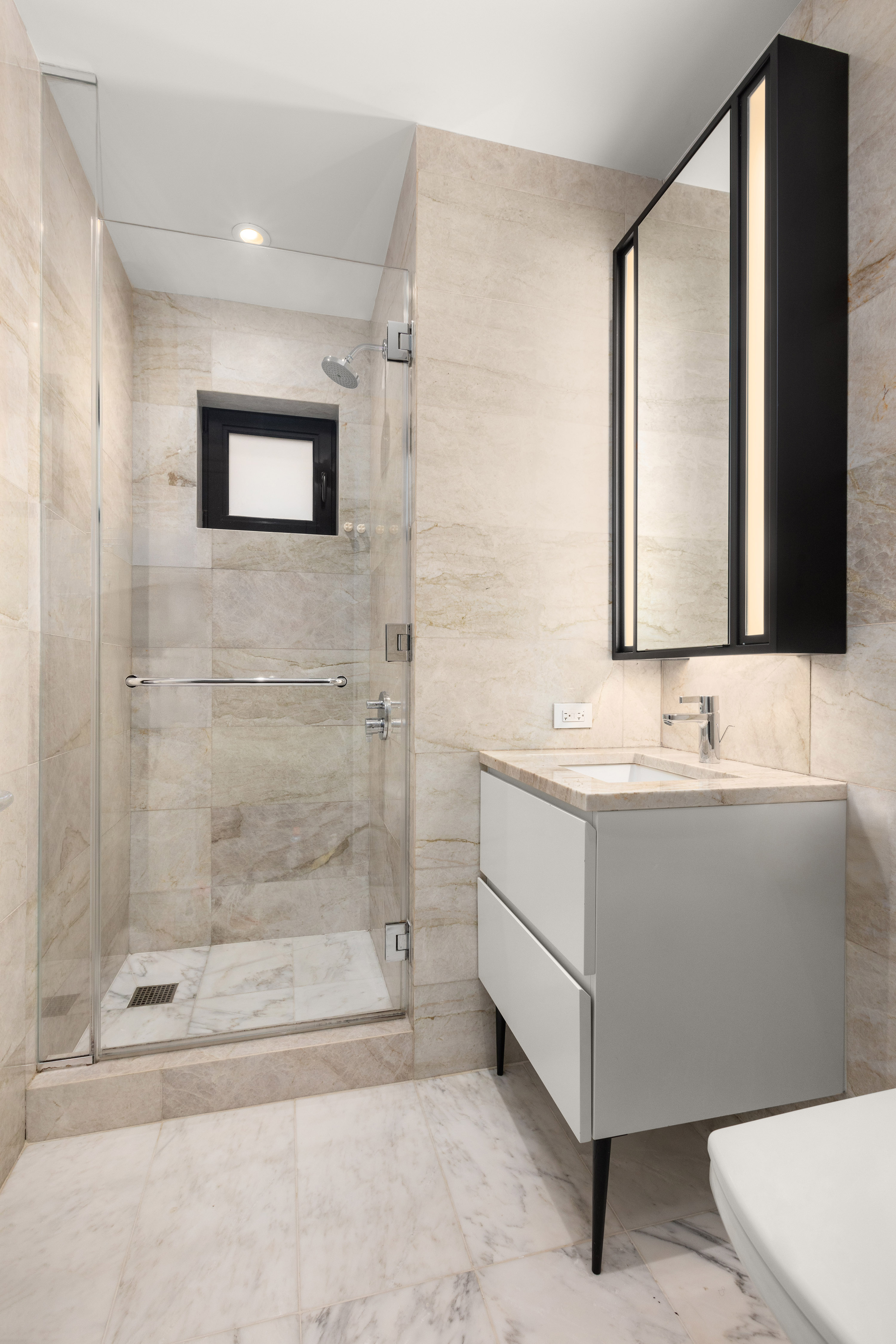 11 Beach Street, Unit THA Manhattan, NY 10013 - Photo 19 of 29 a bathroom with a bathtub and a sink