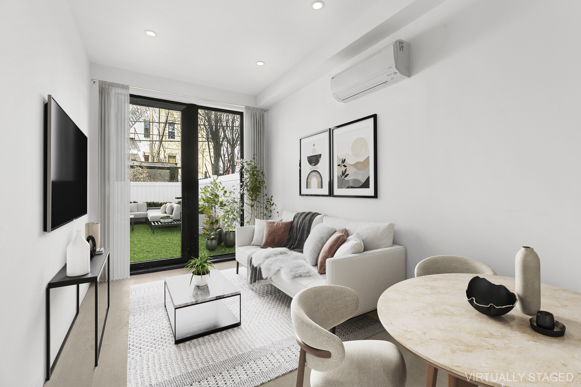 647 Dekalb Avenue, Unit 1B Brooklyn, NY 11216 - Photo 3 of 9 a living room with furniture and a flat screen tv