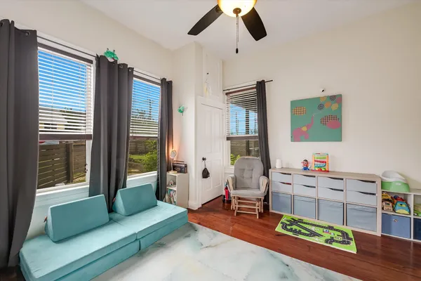 a living room with furniture and a window