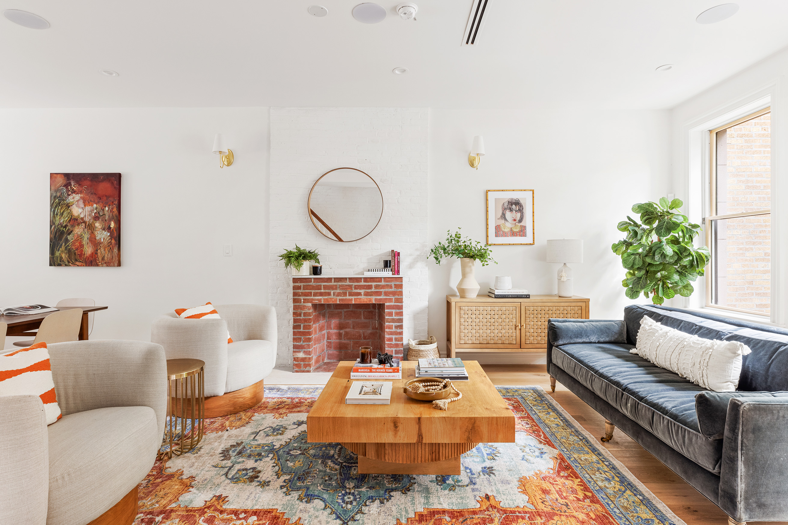363 Warren Street Brooklyn, NY 11201 - Photo 2 of 23 a living room with furniture a rug and a fireplace