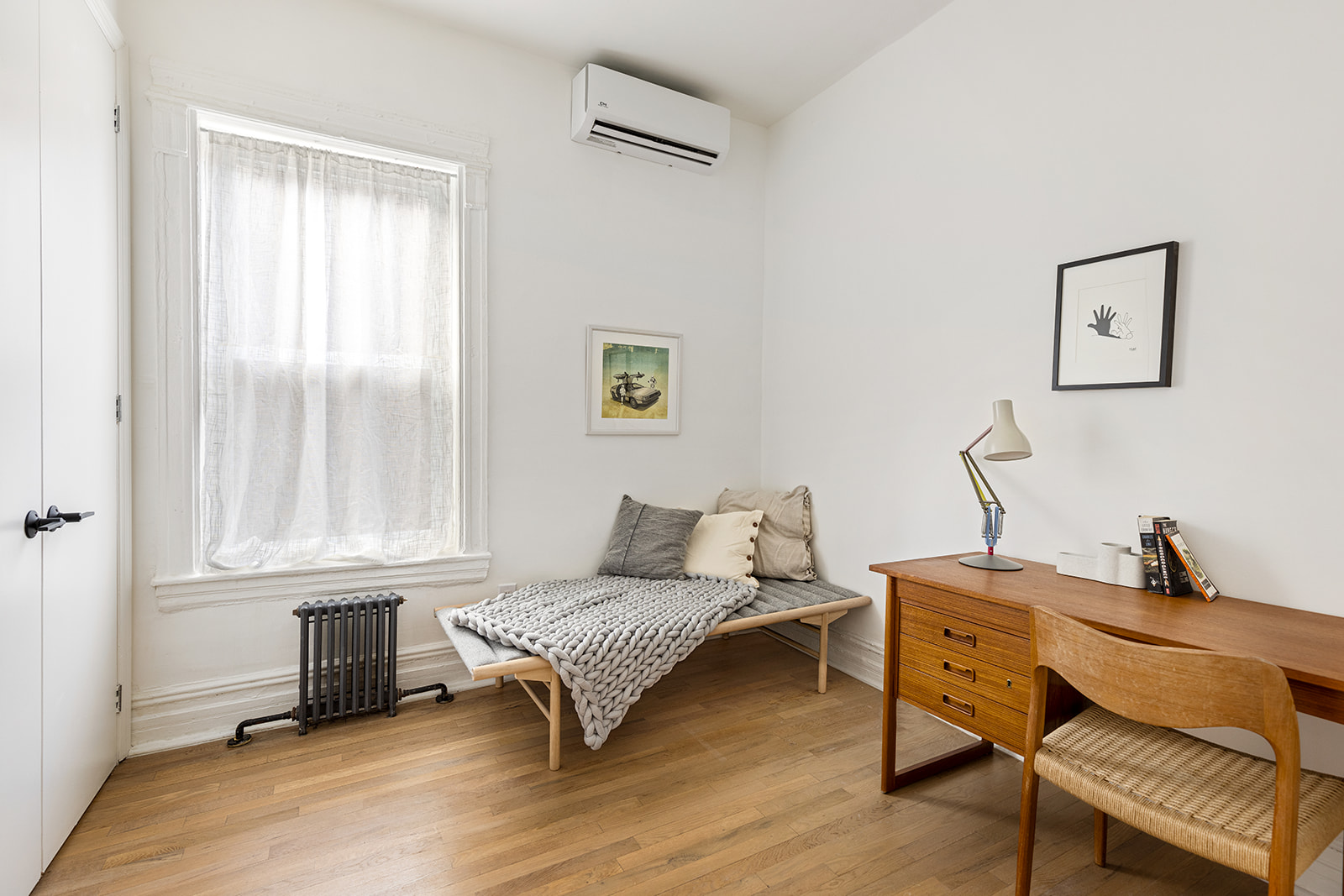 610 Marlborough Road Brooklyn, NY 11226 - Photo 8 of 16 a bedroom with a bed and a window