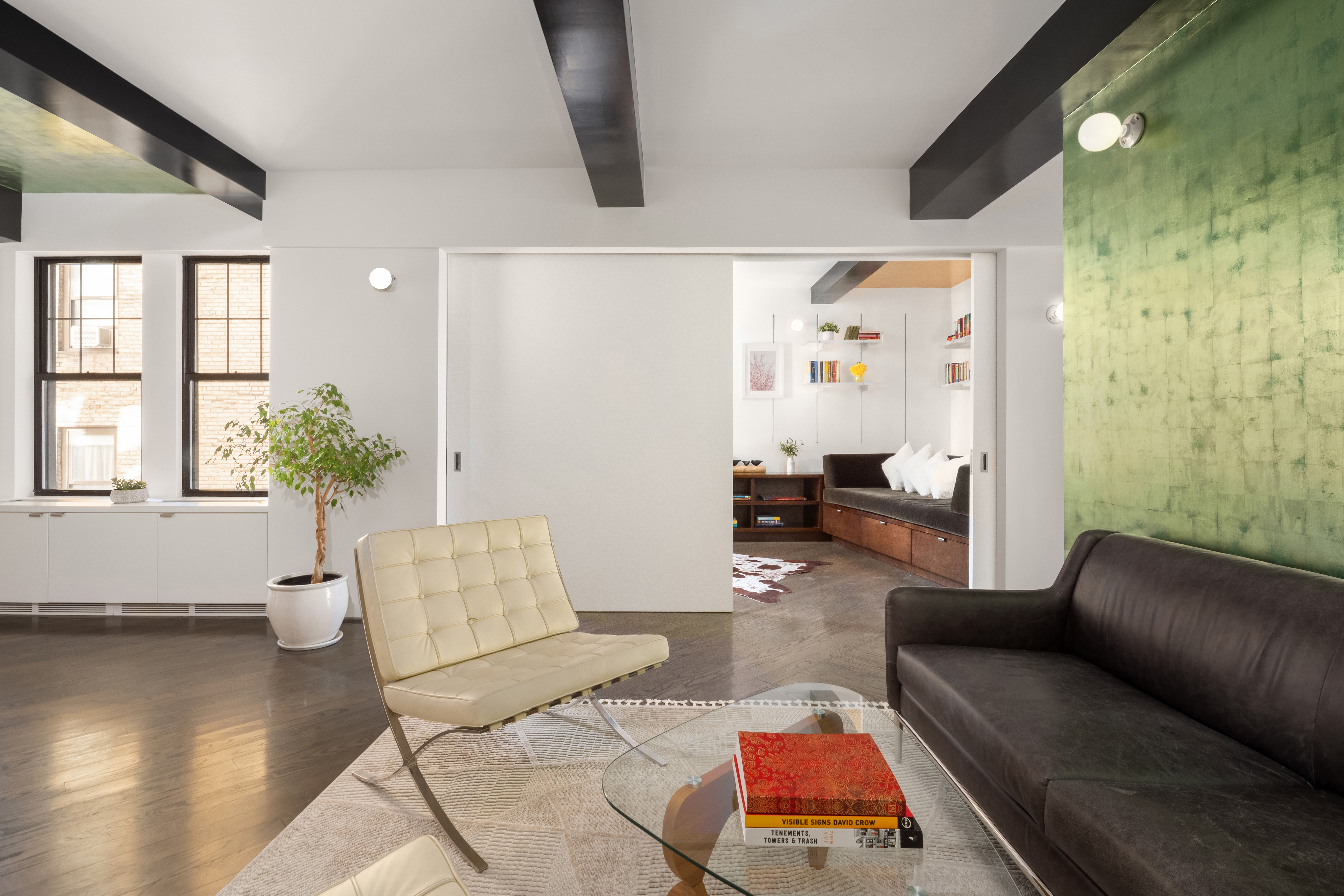 170 2nd Avenue, Unit 5A Manhattan, NY 10003 - Photo 2 of 15 a living room with furniture and wooden floor