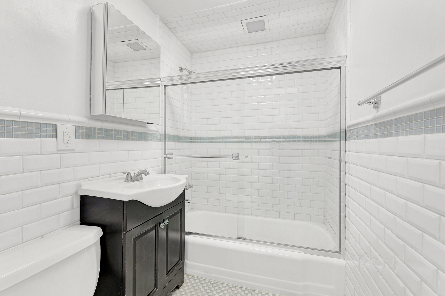 125 Beach 124th Street, Unit 5K Queens, NY 11694 - Photo 13 of 21 a bathroom with a sink toilet and shower