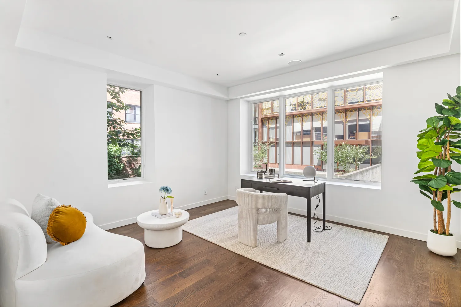 a living room with furniture and window