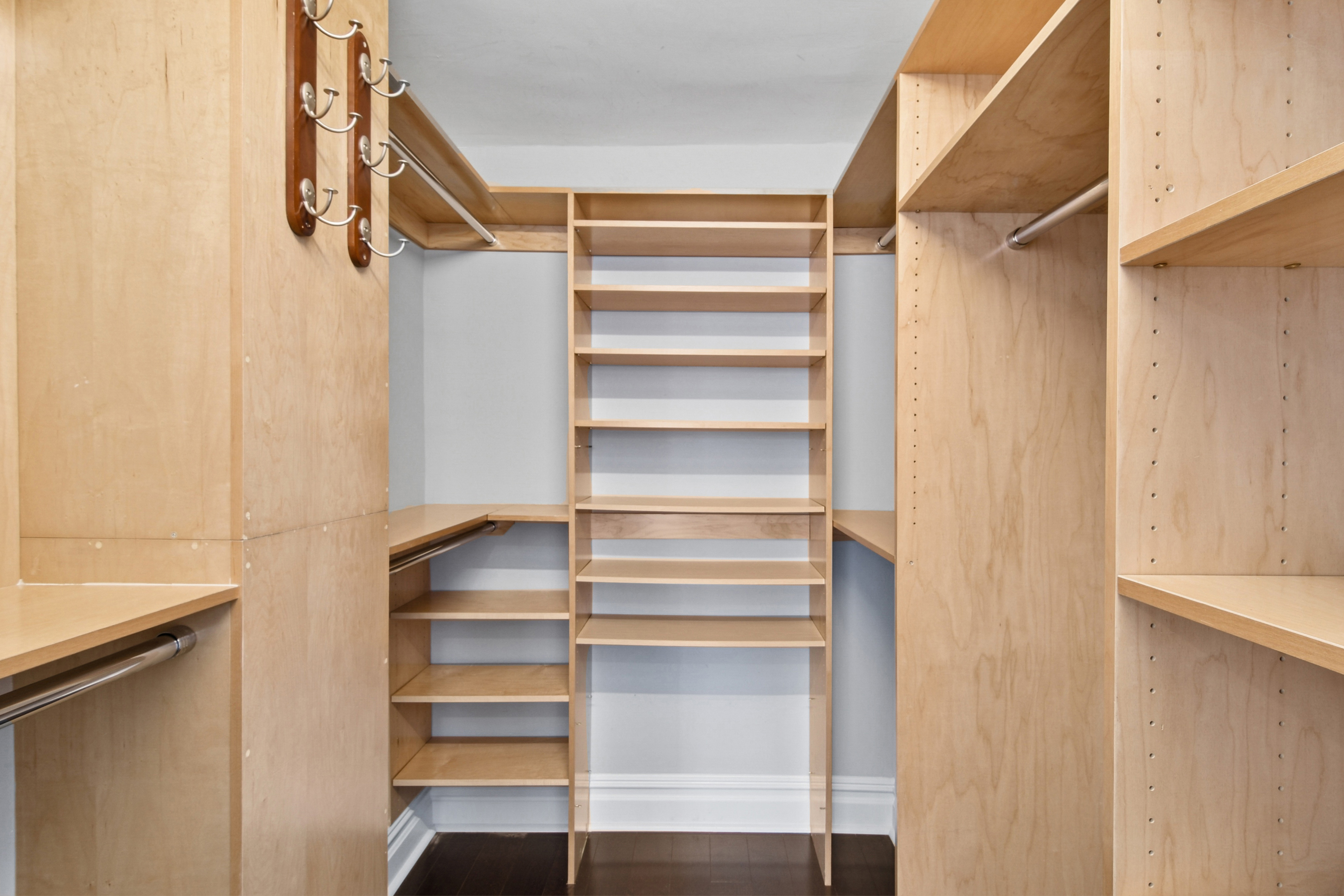 310 East 70th Street, Unit 10E Manhattan, NY 10021 - Photo 4 of 14 a view of walk in closet with empty racks