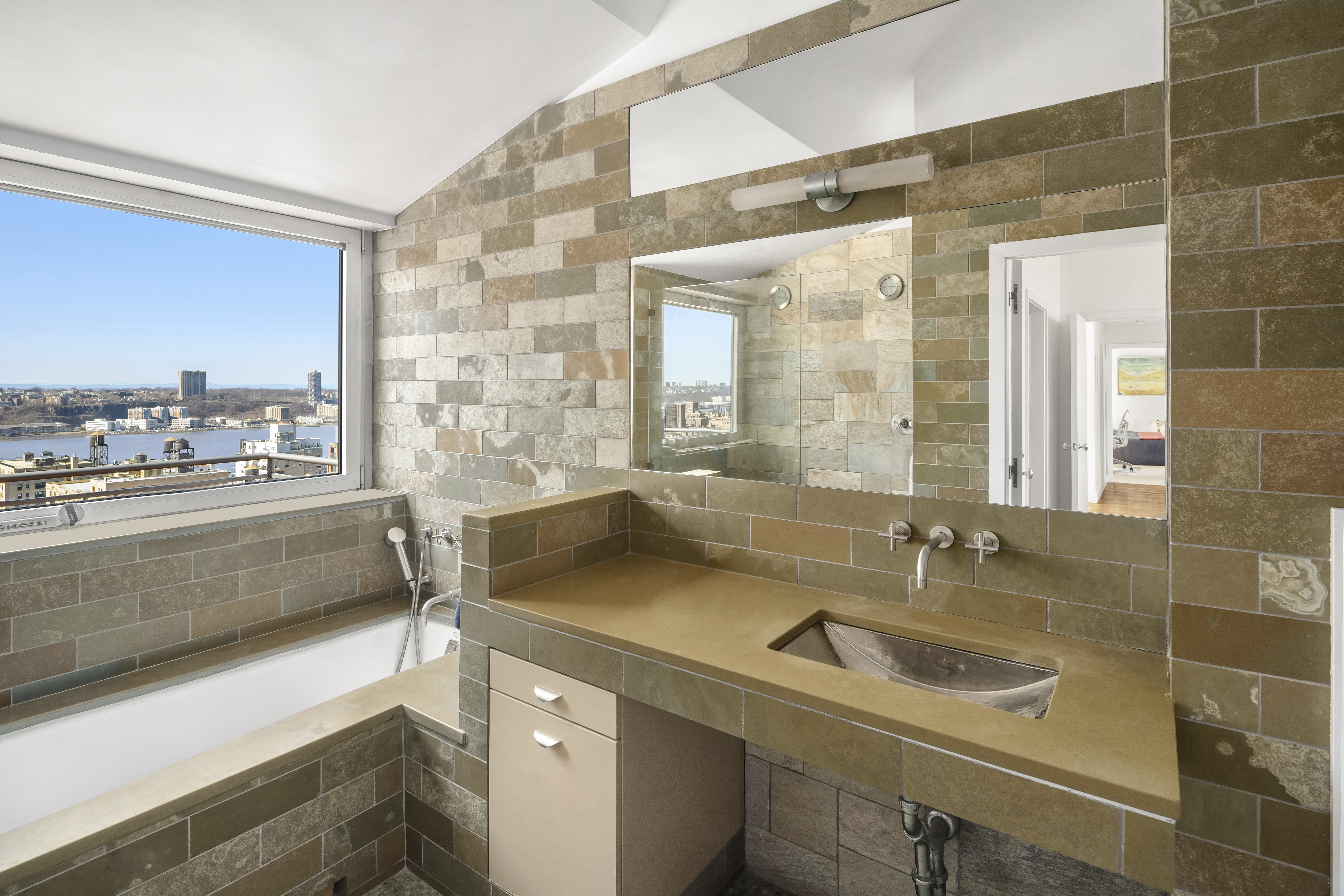 2166 Broadway, Unit PH Manhattan, NY 10024 - Photo 10 of 37 a bathroom with a sink and a large mirror