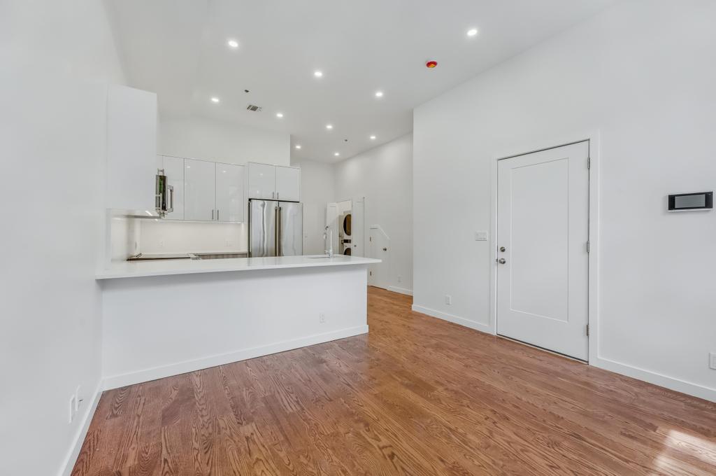 109 President Street, Unit 2 Brooklyn, NY 11231 - Photo 5 of 20 a view of kitchen with wooden floor