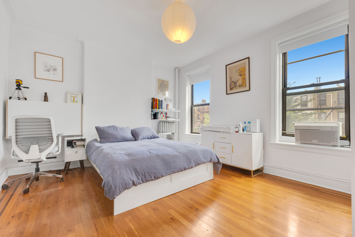74 2nd Place, Unit 2B Brooklyn, NY 11231 - Photo 6 of 14 a spacious bedroom with a bed furniture and windows