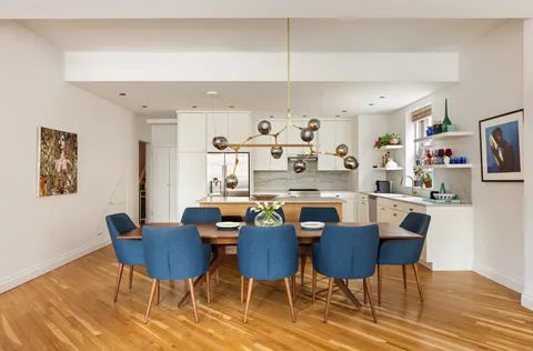 a view of a dining room with furniture