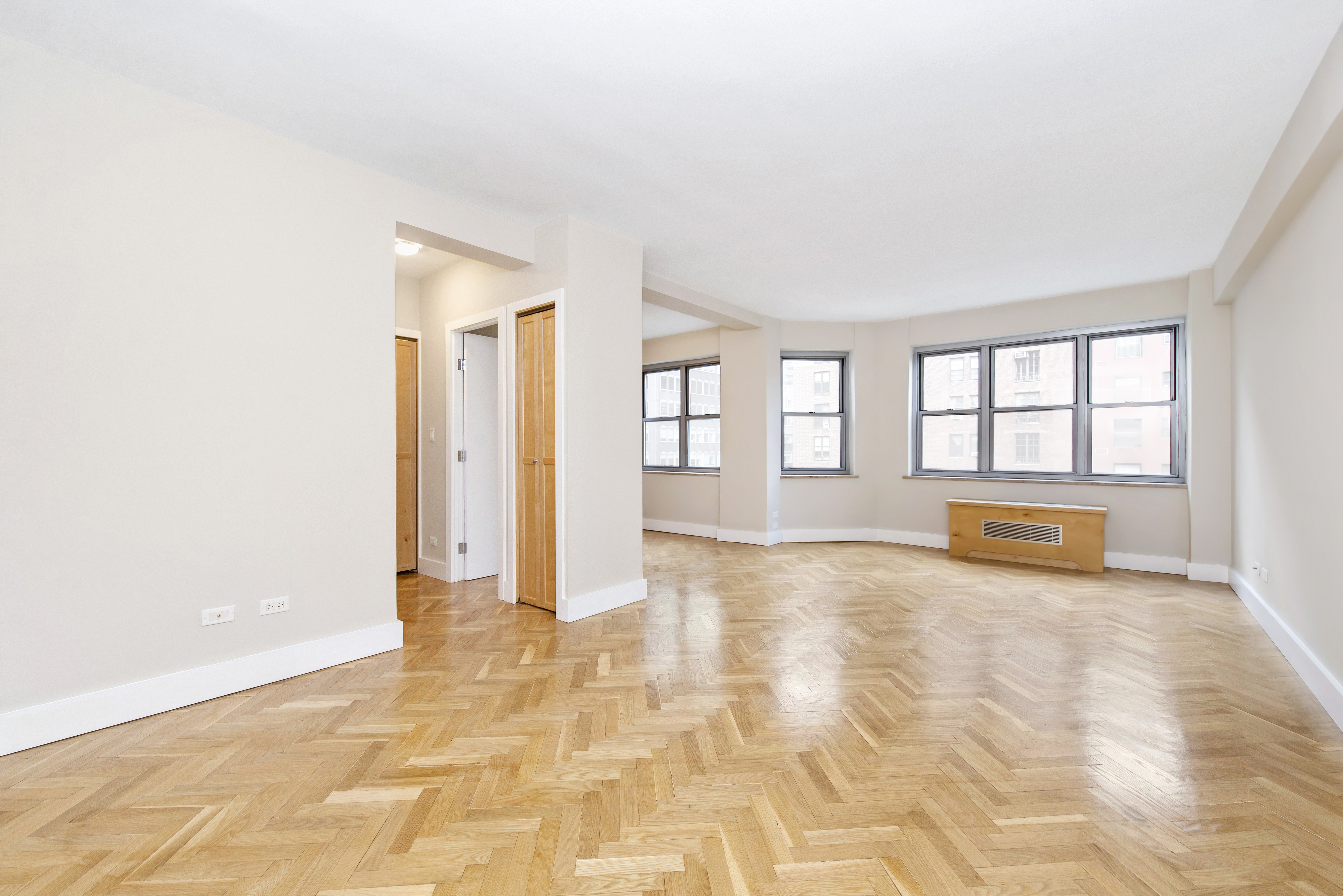 80 Park Avenue, Unit 9L Manhattan, NY 10016 - Photo 2 of 10 a view of an empty room with a window
