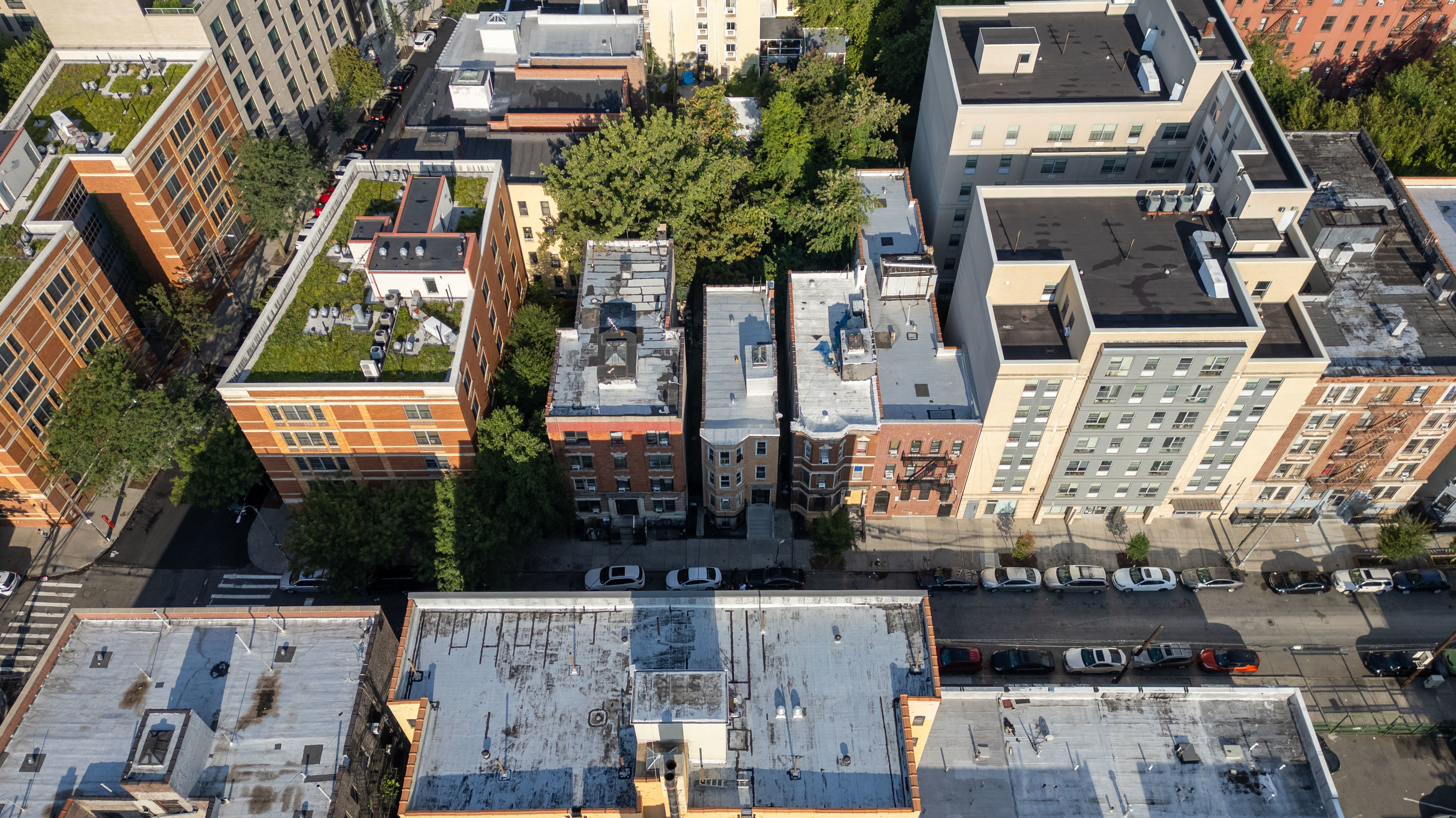 2023 Hughes Avenue Bronx, NY 10457 - Photo 33 of 63 an aerial view of residential houses with outdoor space