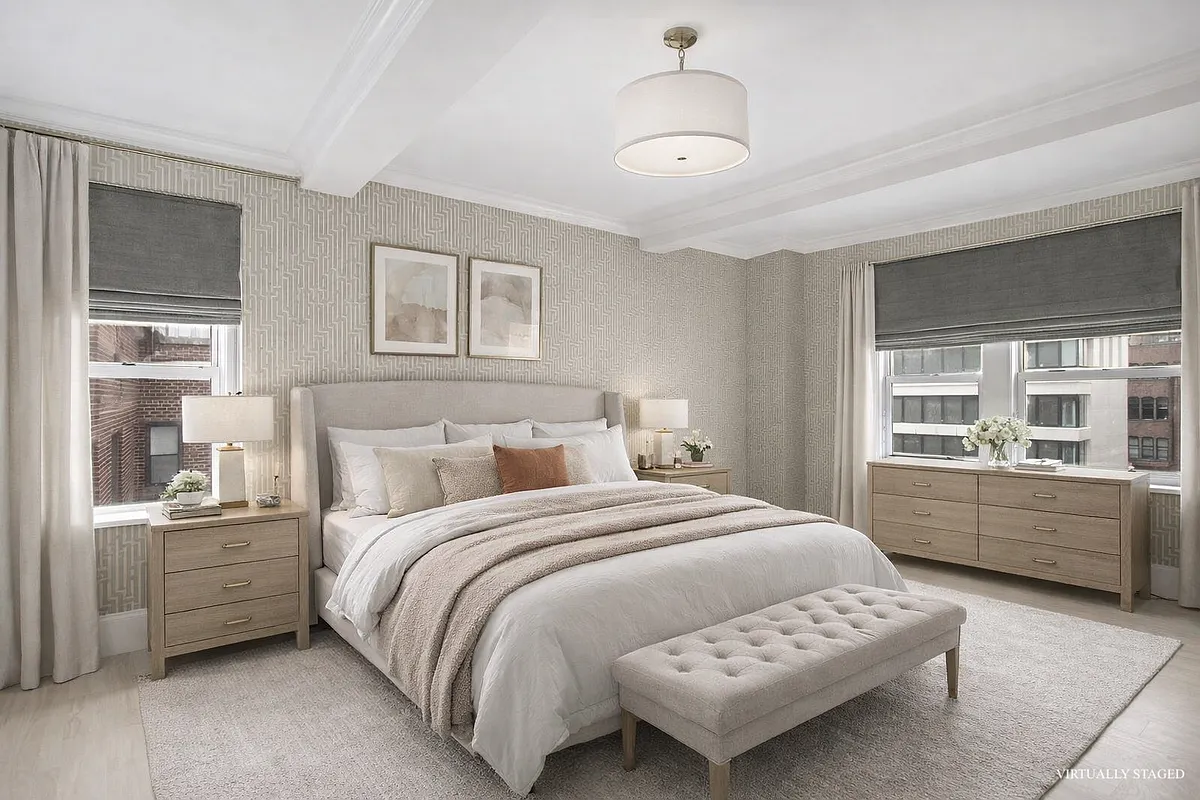 167 East 82nd Street, Unit 9B Manhattan, NY 10028 - Photo 5 of 15 a bedroom with a bed and a window