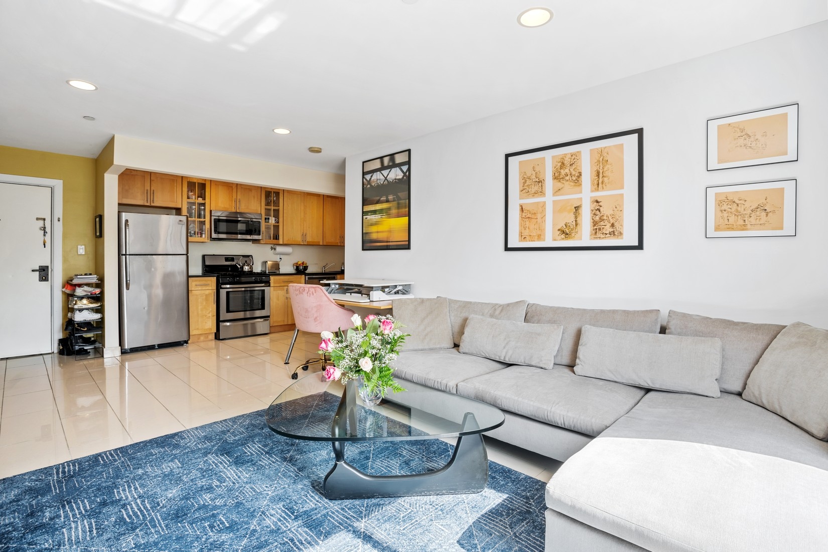 201 Huron Street, Unit 4F Brooklyn, NY 11222 - Photo 3 of 12 a living room with furniture kitchen and a table