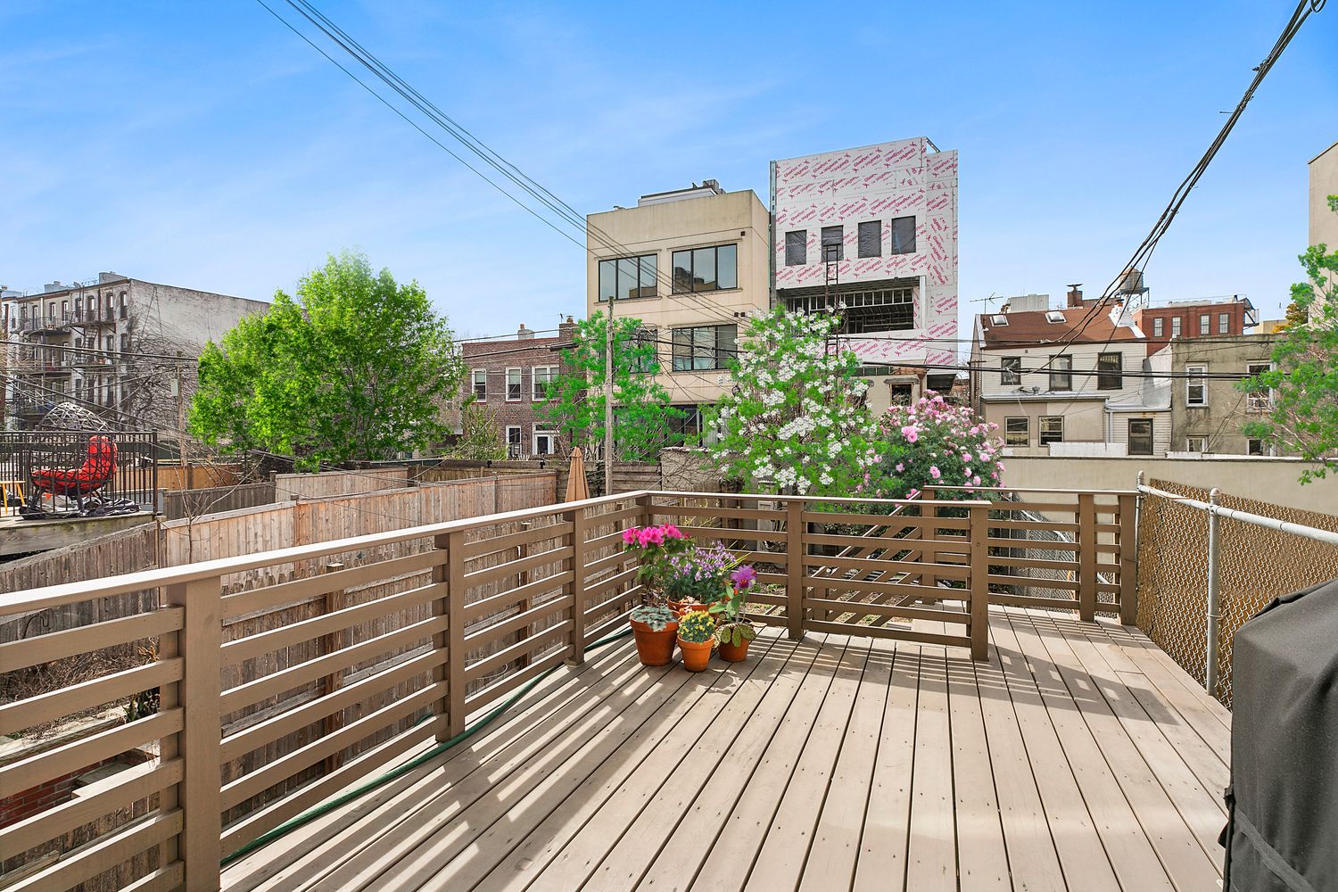 a view of balcony with furniture