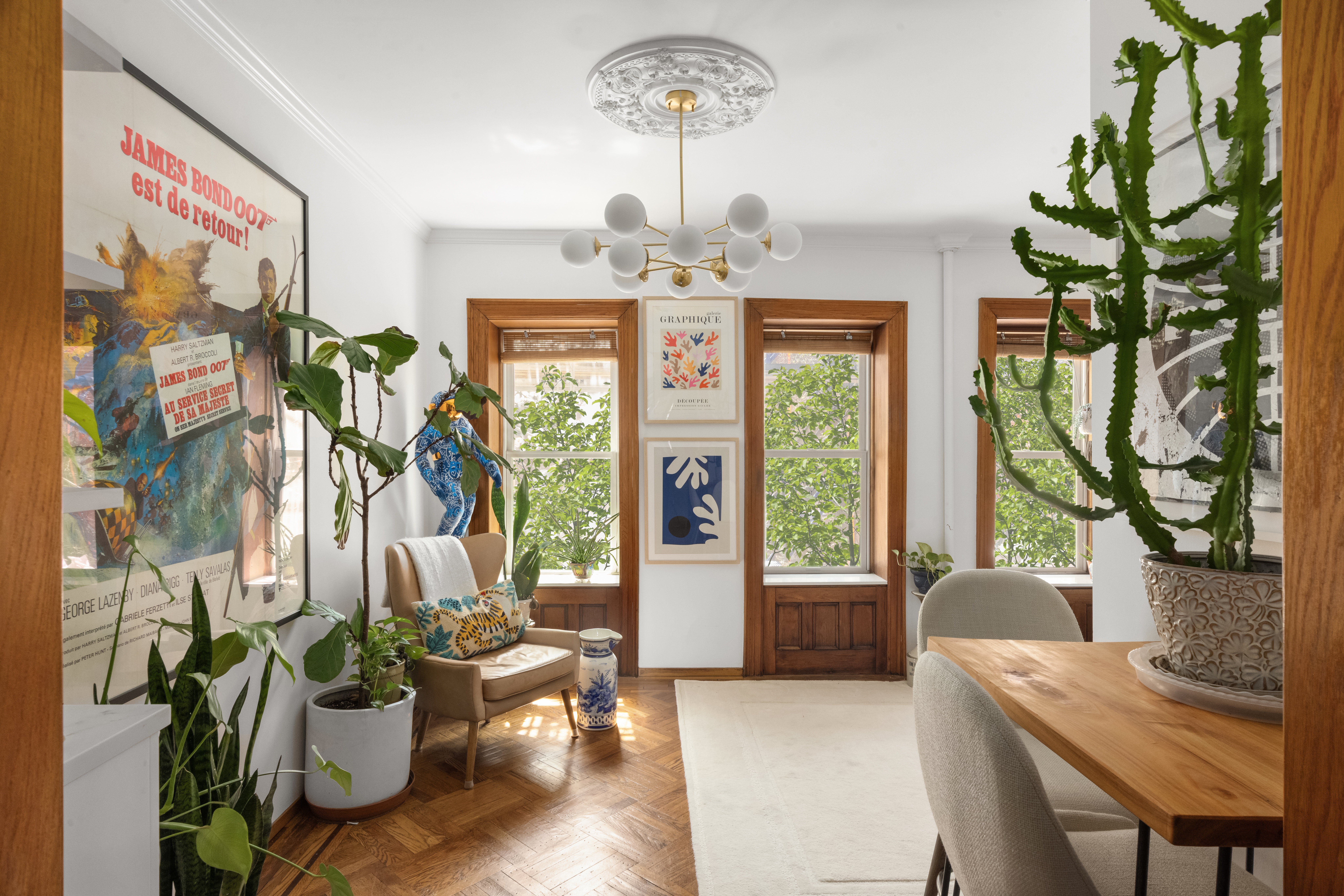 237 West 11th Street, Unit 2B Manhattan, NY 10014 - Photo 3 of 13 a living room with furniture and a large window