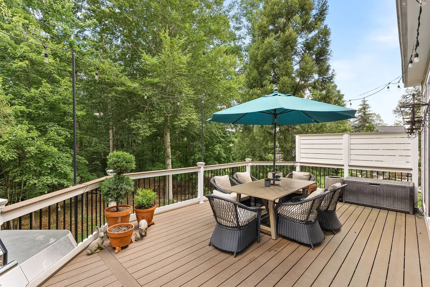 a view of balcony with outdoor seating and wooden floor
