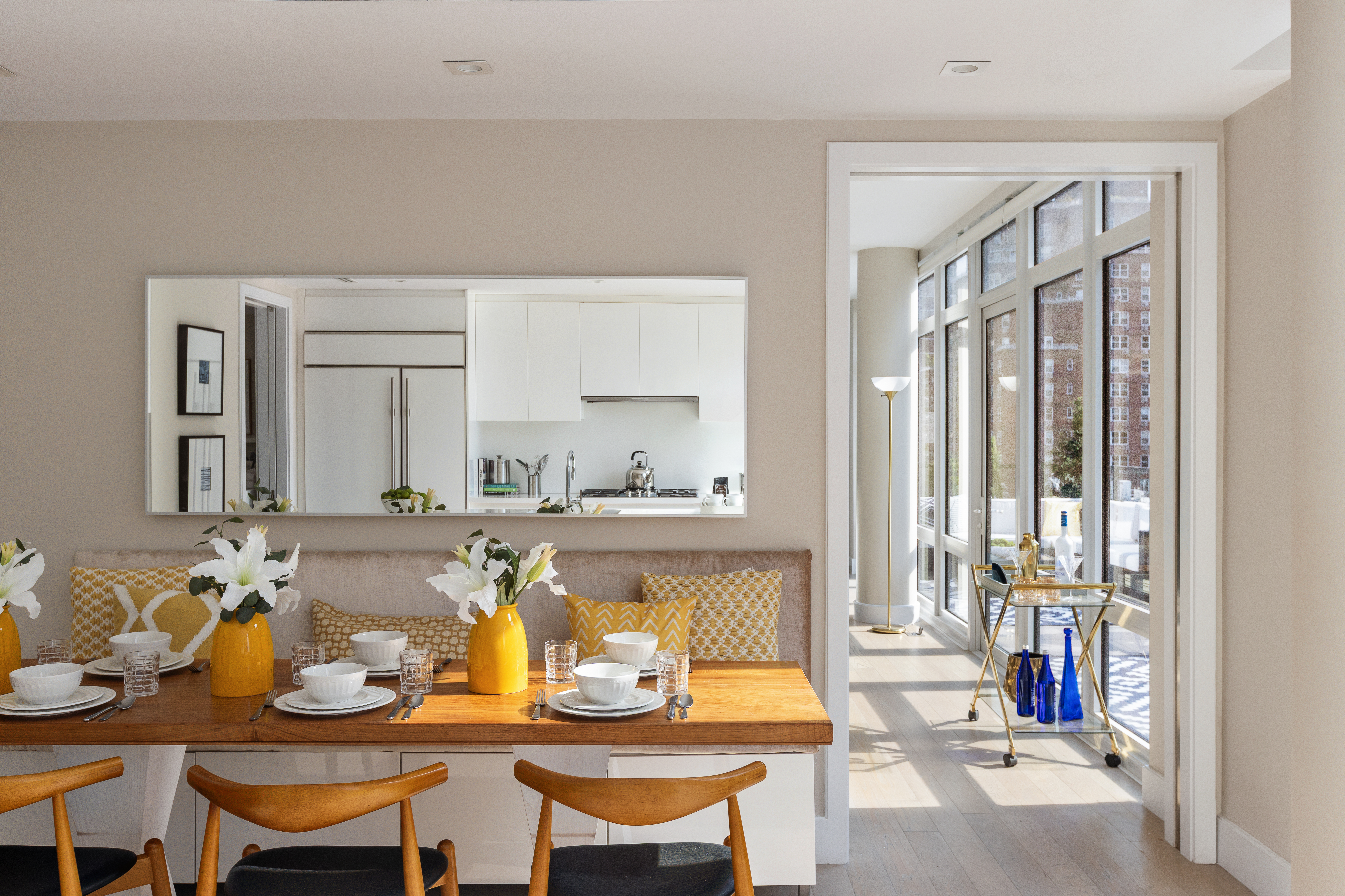 1355 1st Avenue, Unit 8 Manhattan, NY 10021 - Photo 9 of 25 a dining hall with furniture and large windows