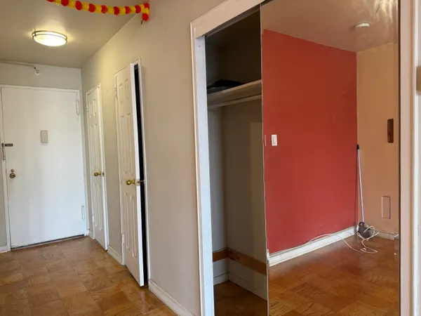 a bathroom with a shower a sink and a mirror