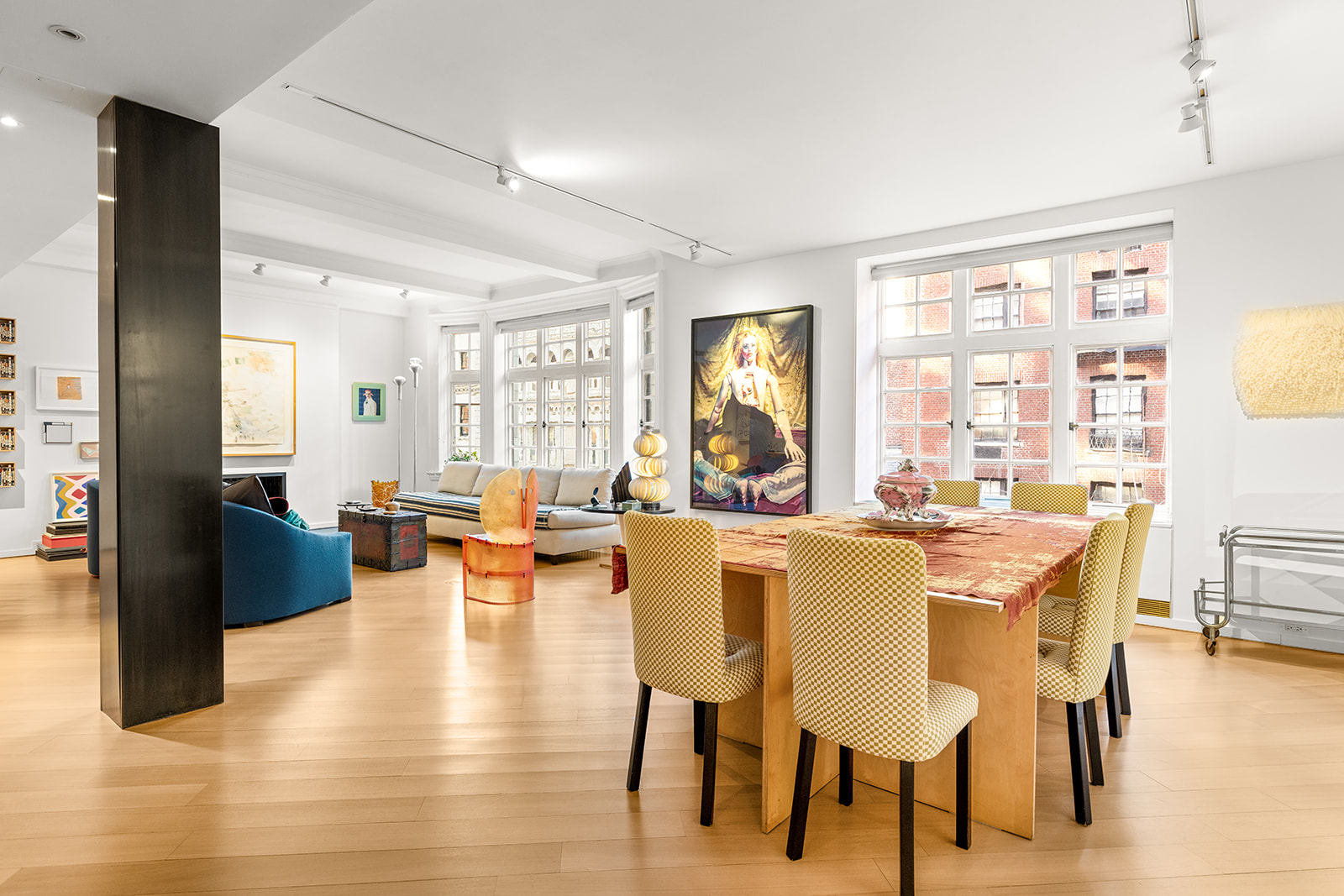 40 East 62nd Street, Unit 6E Manhattan, NY 10065 - Photo 9 of 25 a dining room with furniture and wooden floor