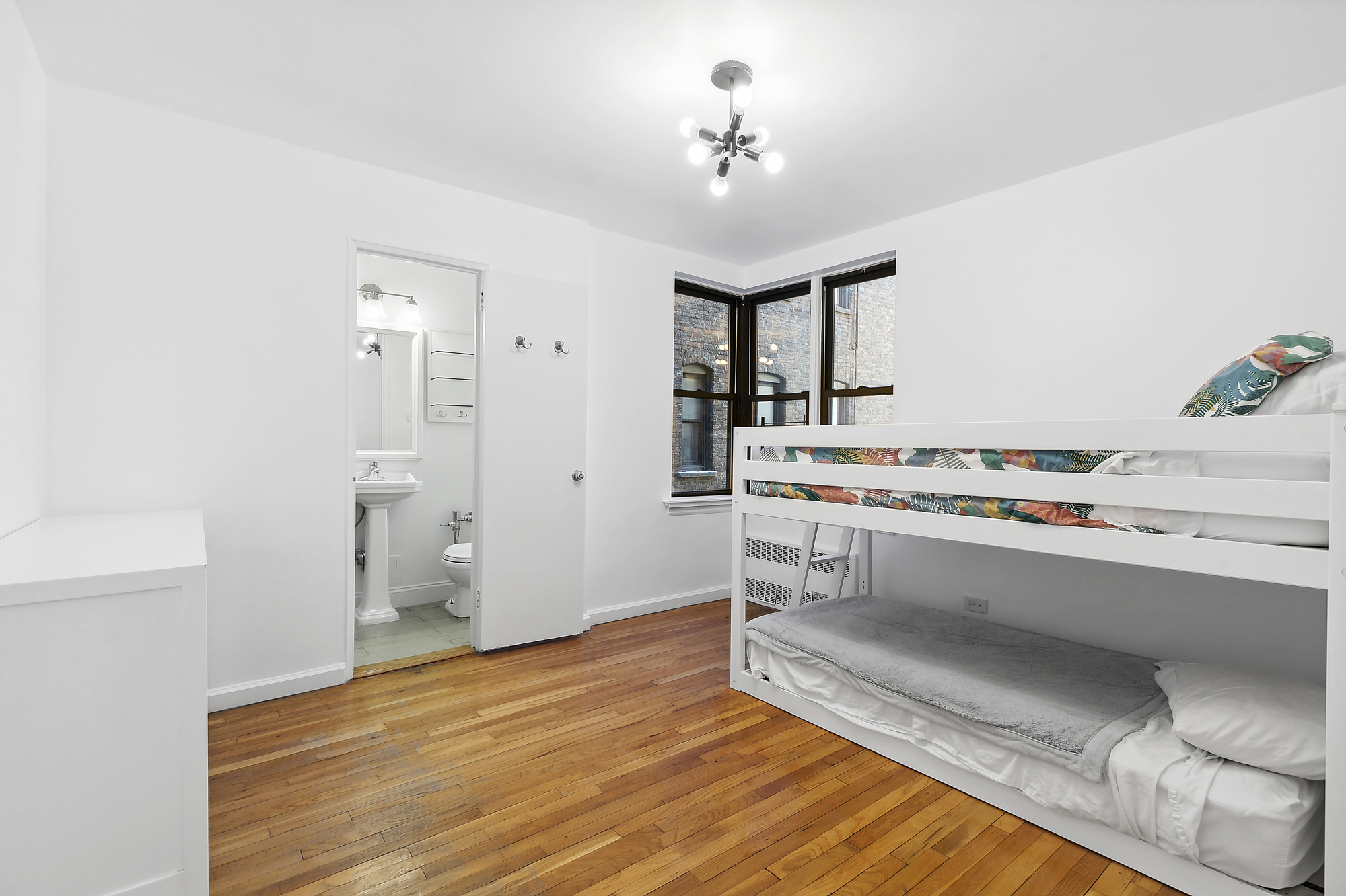 157 East 18th Street, Unit 4H Manhattan, NY 10003 - Photo 6 of 7 a view of kitchen with sink and natural light