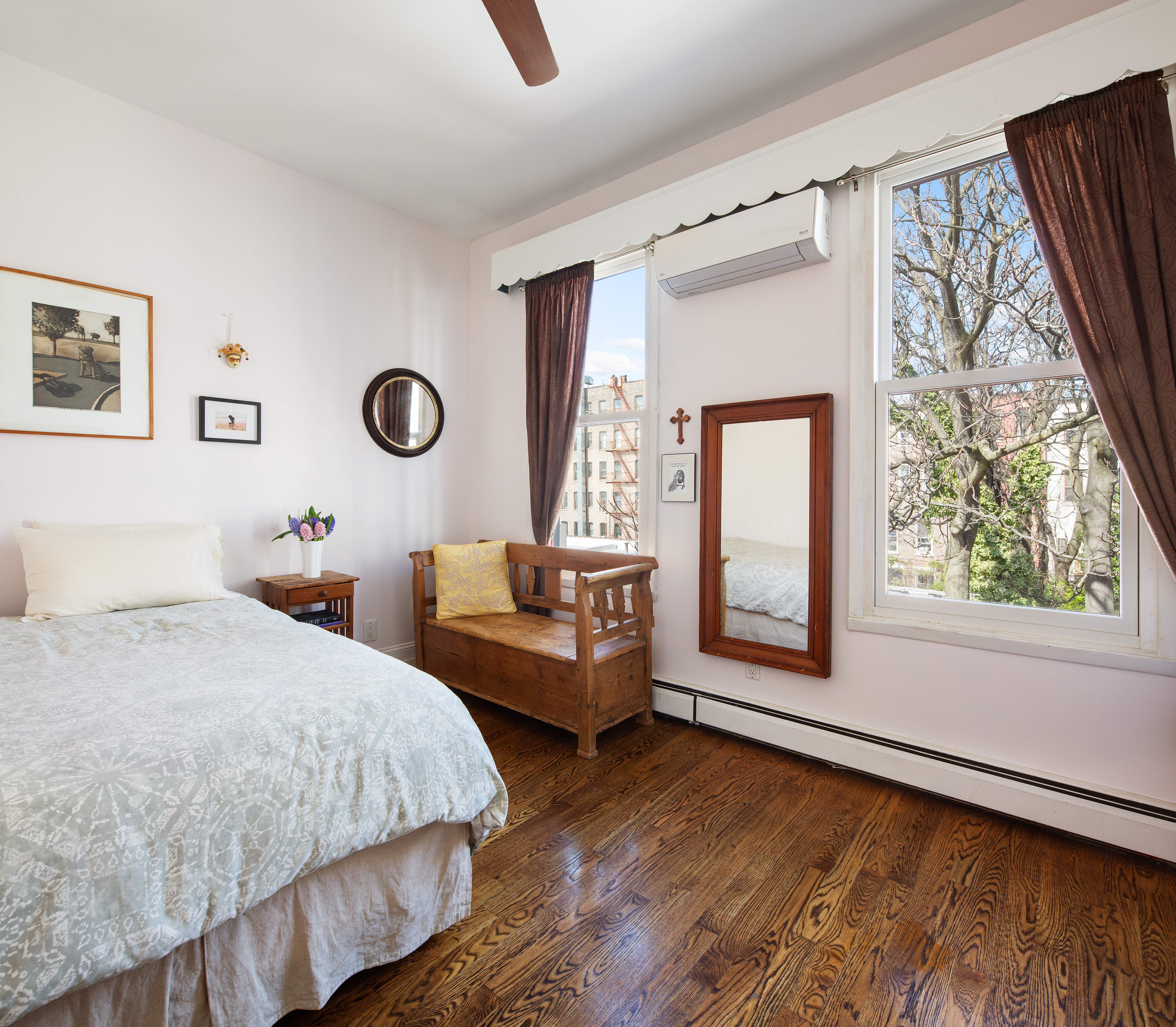 11 Sylvan Terrace Manhattan, NY 10032 - Photo 11 of 16 a bedroom with a bed and a window