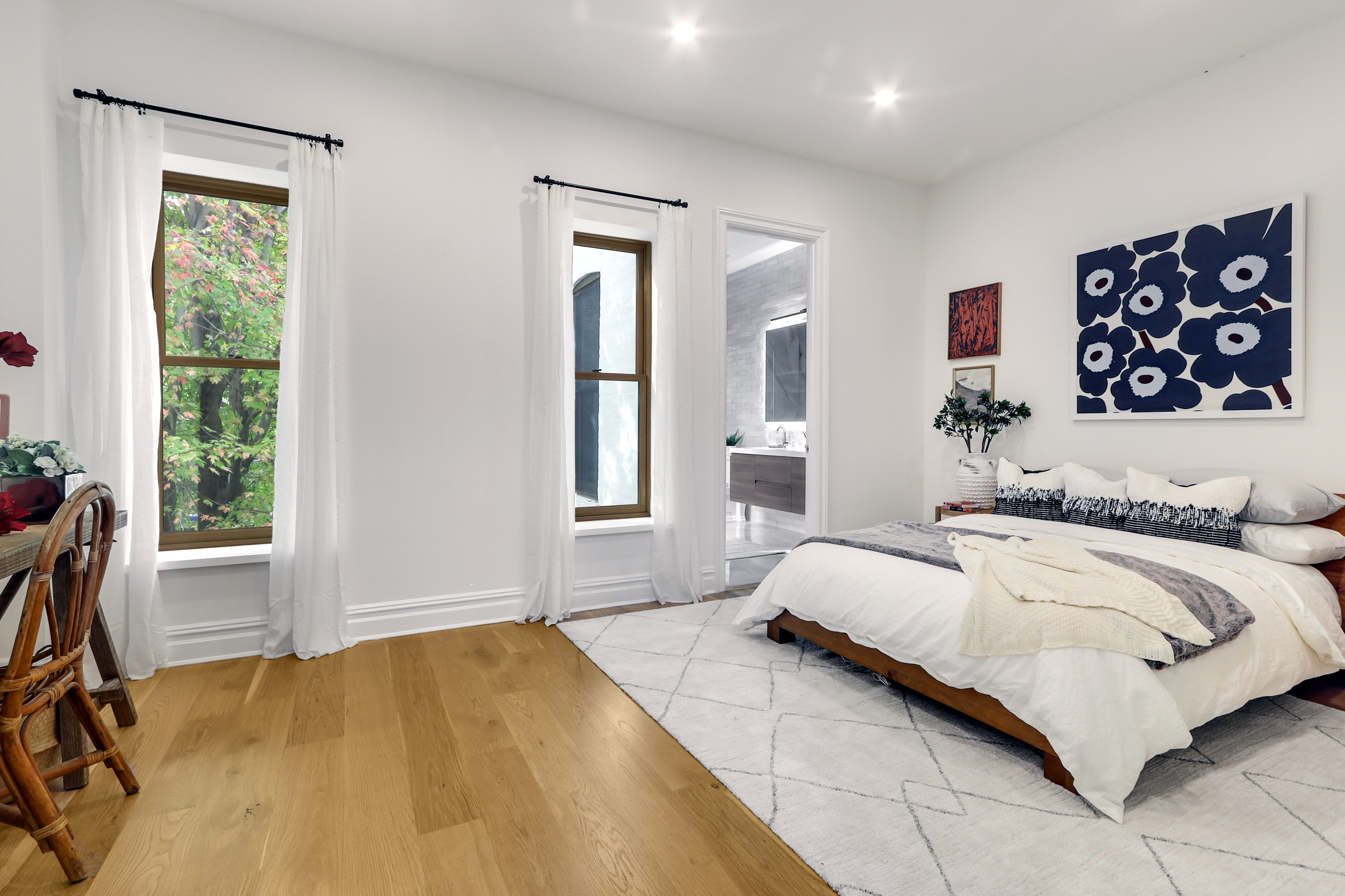 220 Lewis Avenue Brooklyn, NY 11221 - Photo 12 of 22 a bedroom with a bed and a window