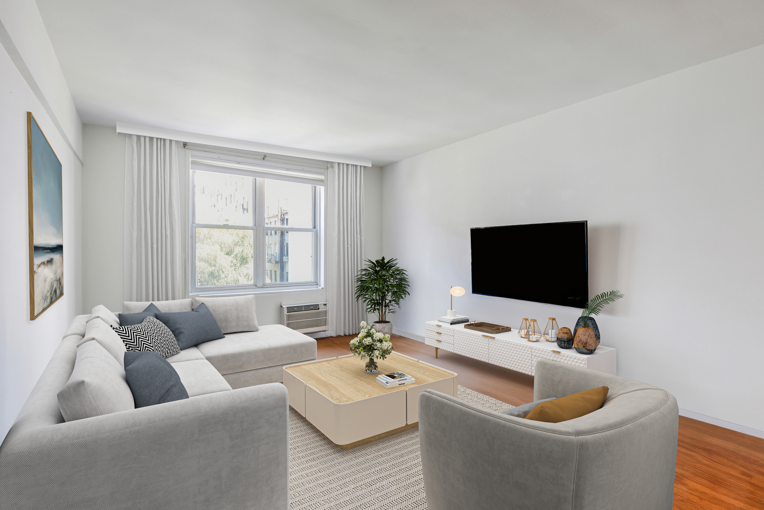 88 Bleecker Street, Unit 5J Manhattan, NY 10012 - Photo 3 of 18 a living room with furniture and a flat screen tv