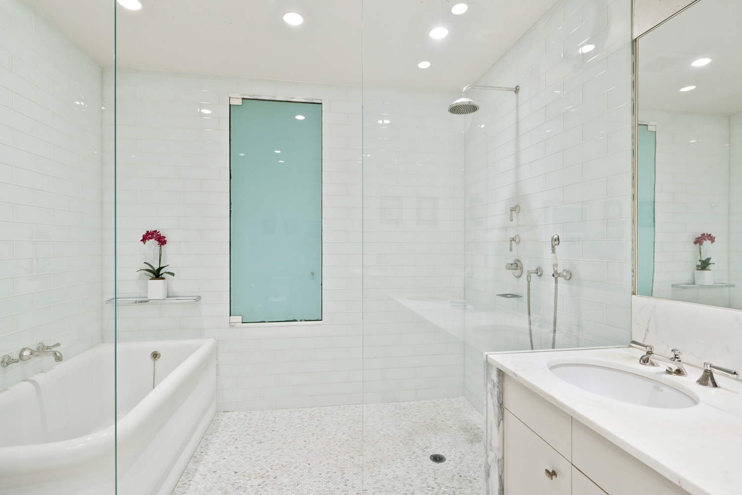 333 Central Park West, Unit 11 Manhattan, NY 10025 - Photo 13 of 21 a bathroom with a bathtub shower sink and mirror