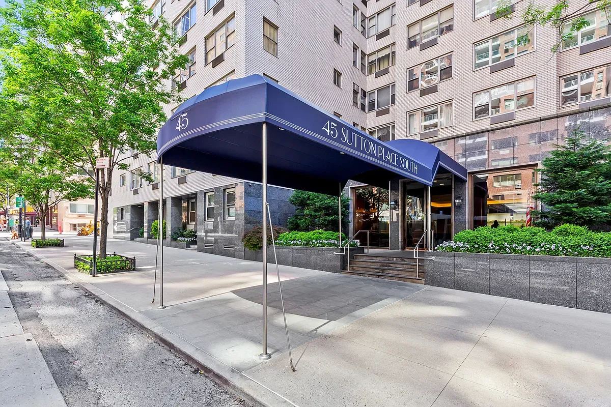 a front view of a building with street view