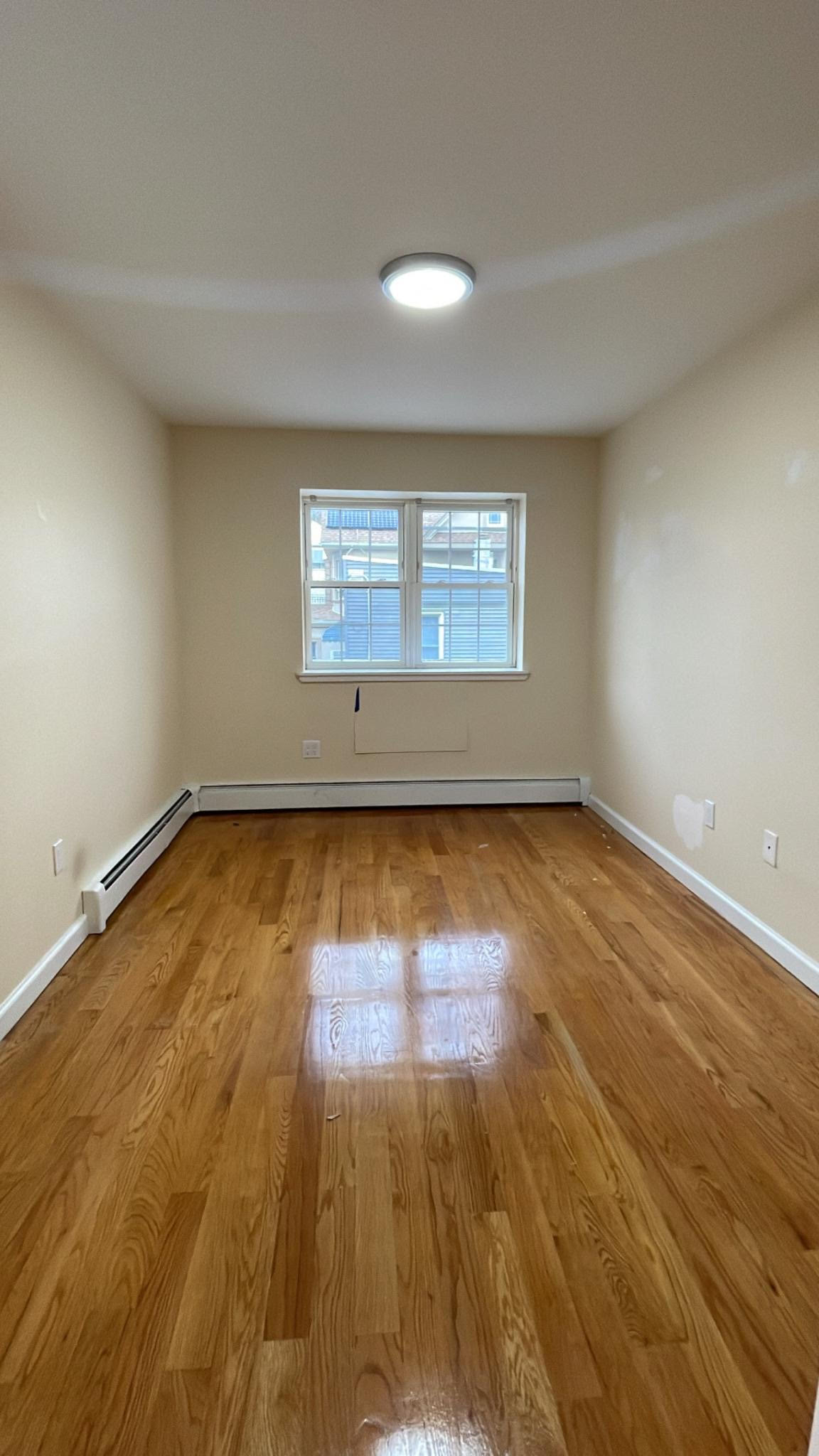 71-01 Cooper Avenue, Unit 3FAM Queens, NY 11385 - Photo 7 of 12