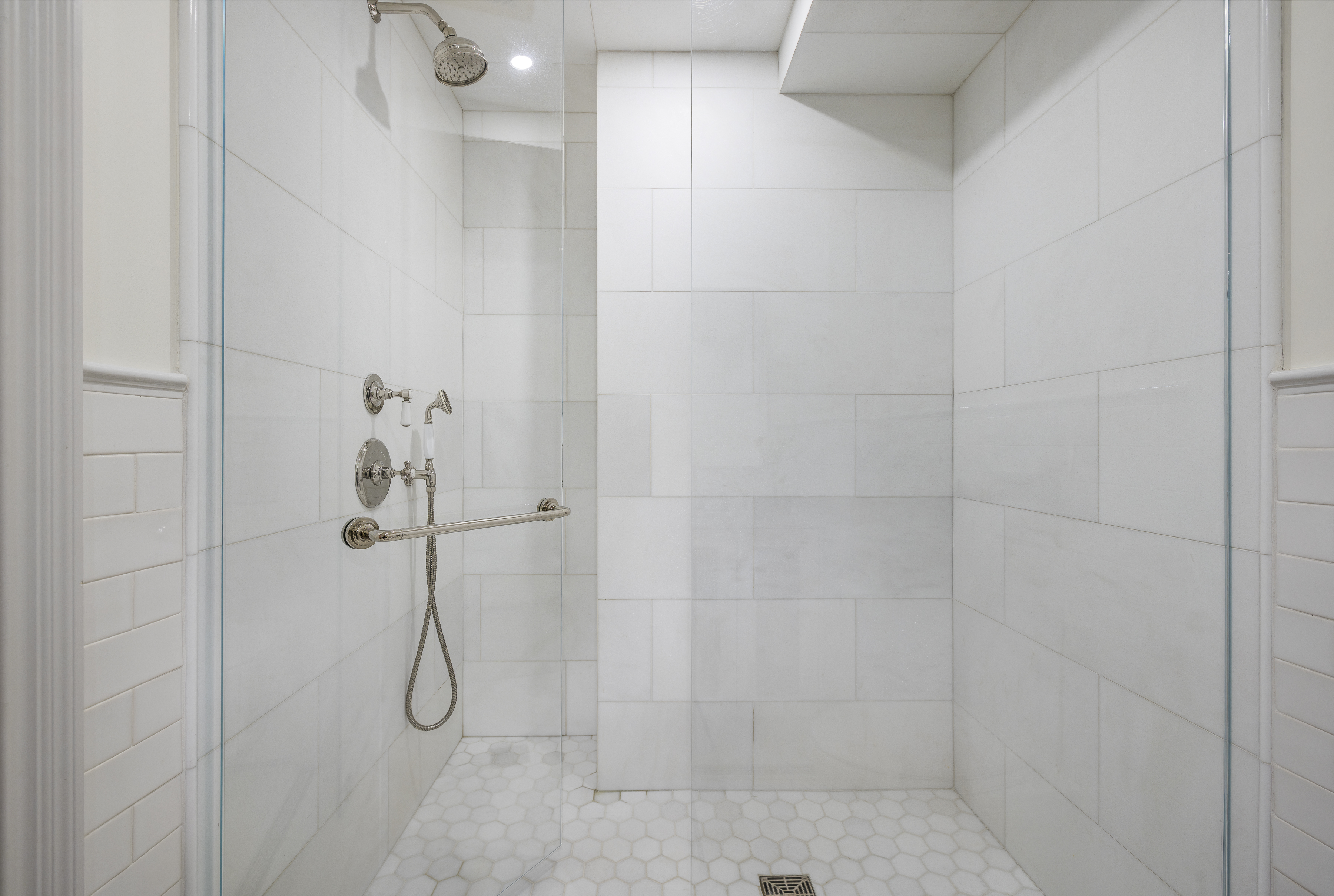 47 East 87th Street, Unit 7A Manhattan, NY 10128 - Photo 17 of 22 a bathroom with a shower