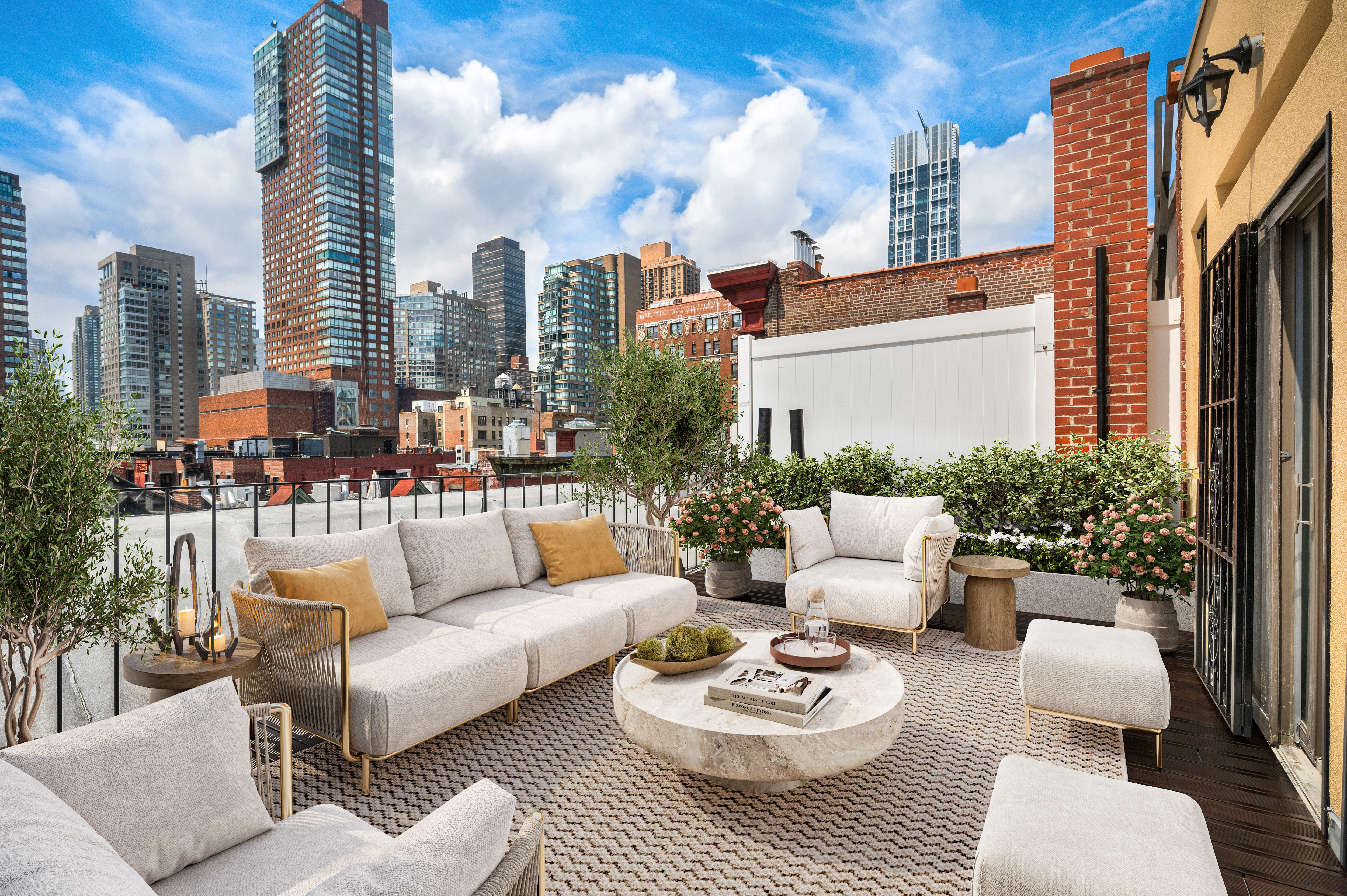 a view of a patio with couches potted plants and a fountain