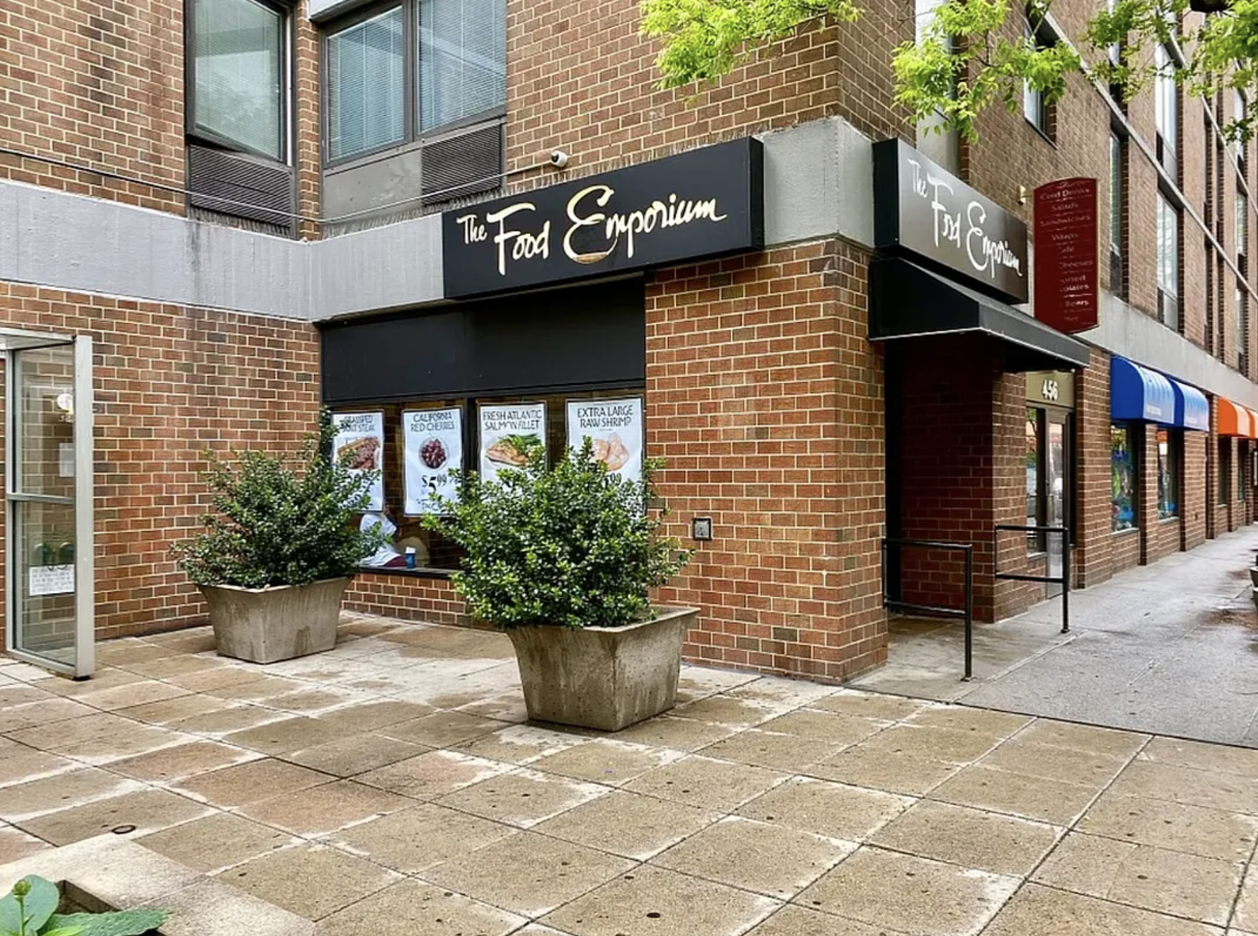 446 West 46th Street, Unit 5 Manhattan, NY 10036 - Photo 10 of 15 a view of a street with potted plants