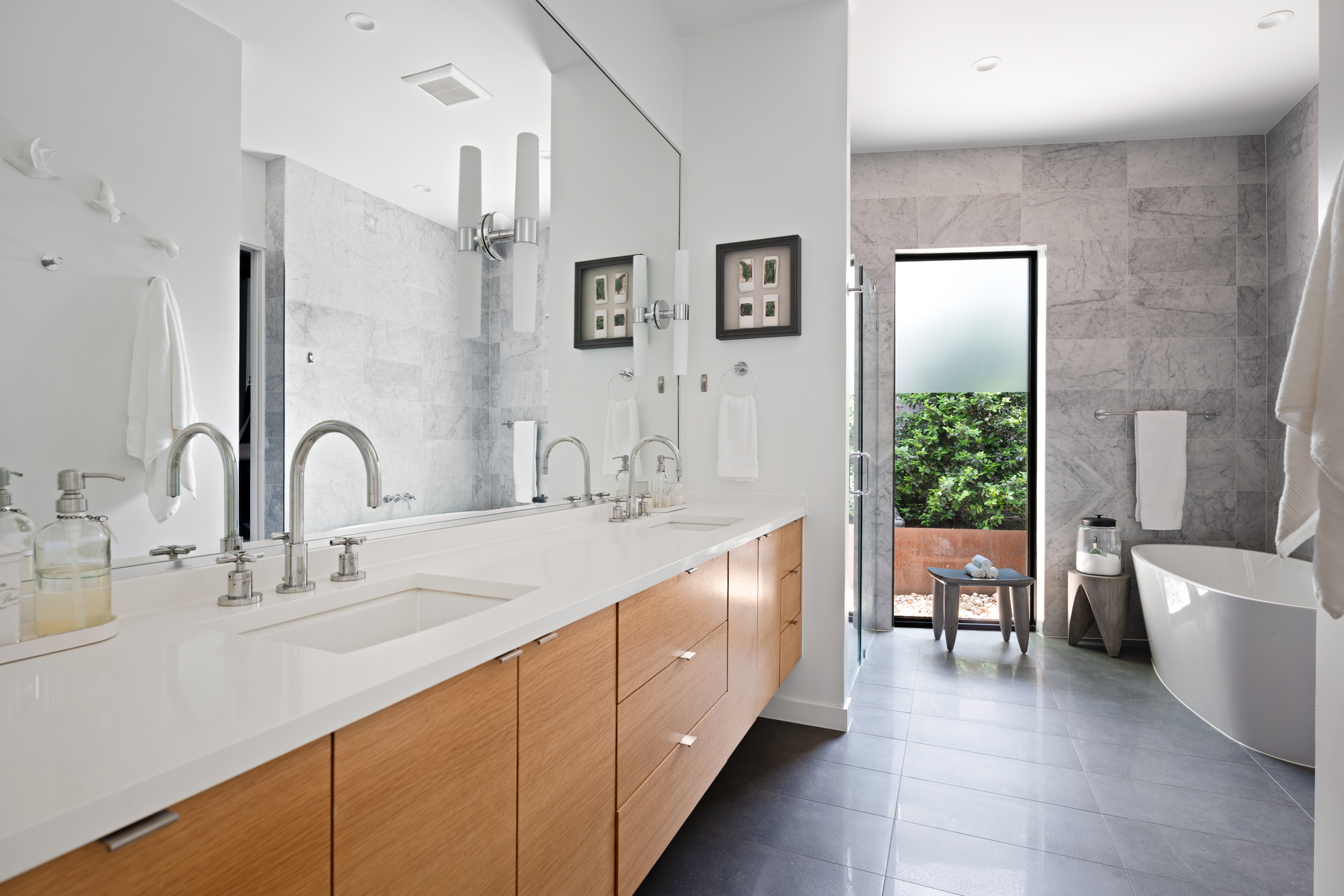 Address Upon Request Austin, TX 78704 - Photo 14 of 27 a spacious en suite bathroom with a double vanity sink a mirror and a bathtub