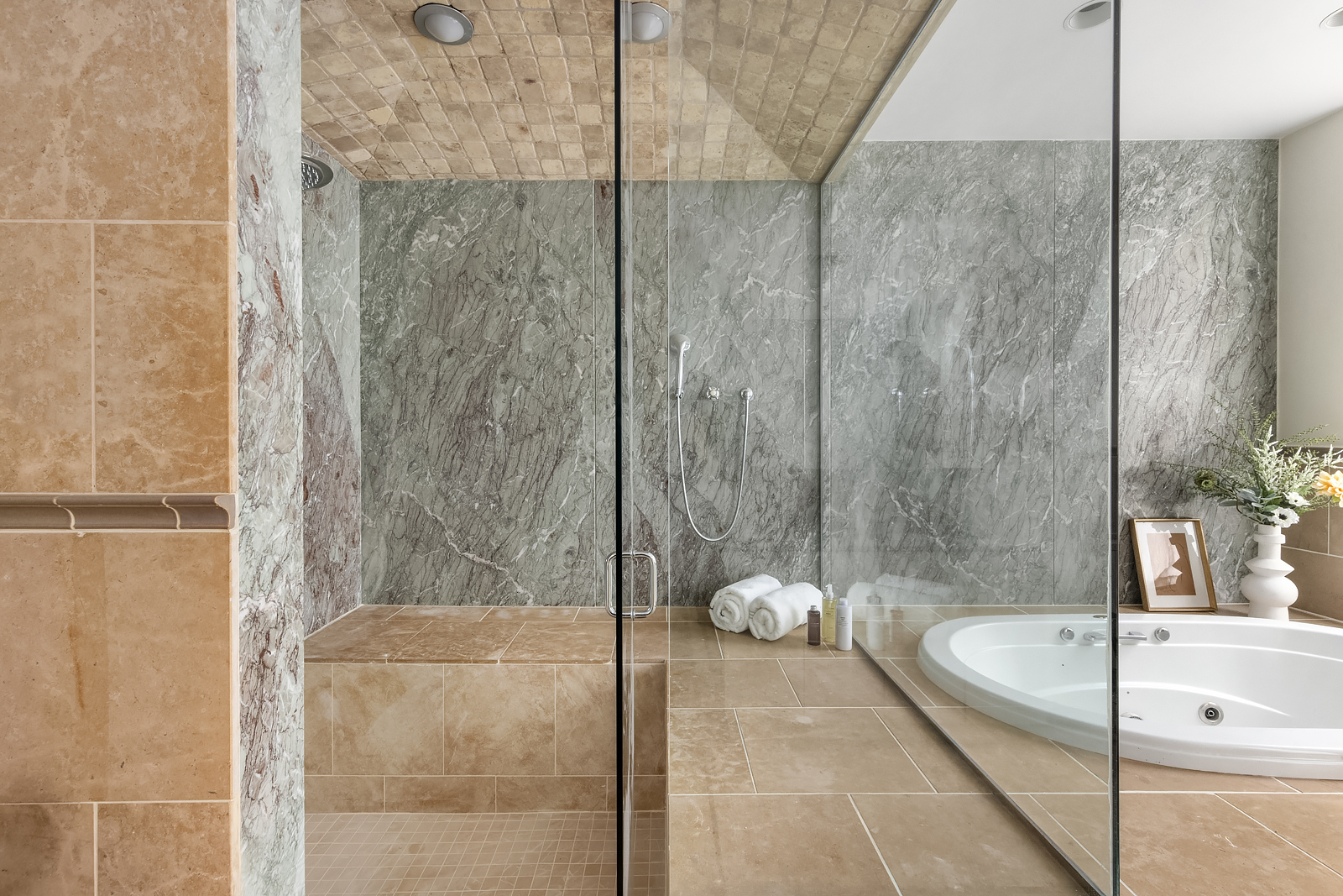 114 Liberty Street, Unit 7 Manhattan, NY 10006 - Photo 12 of 15 a bathroom with a tub and a shower