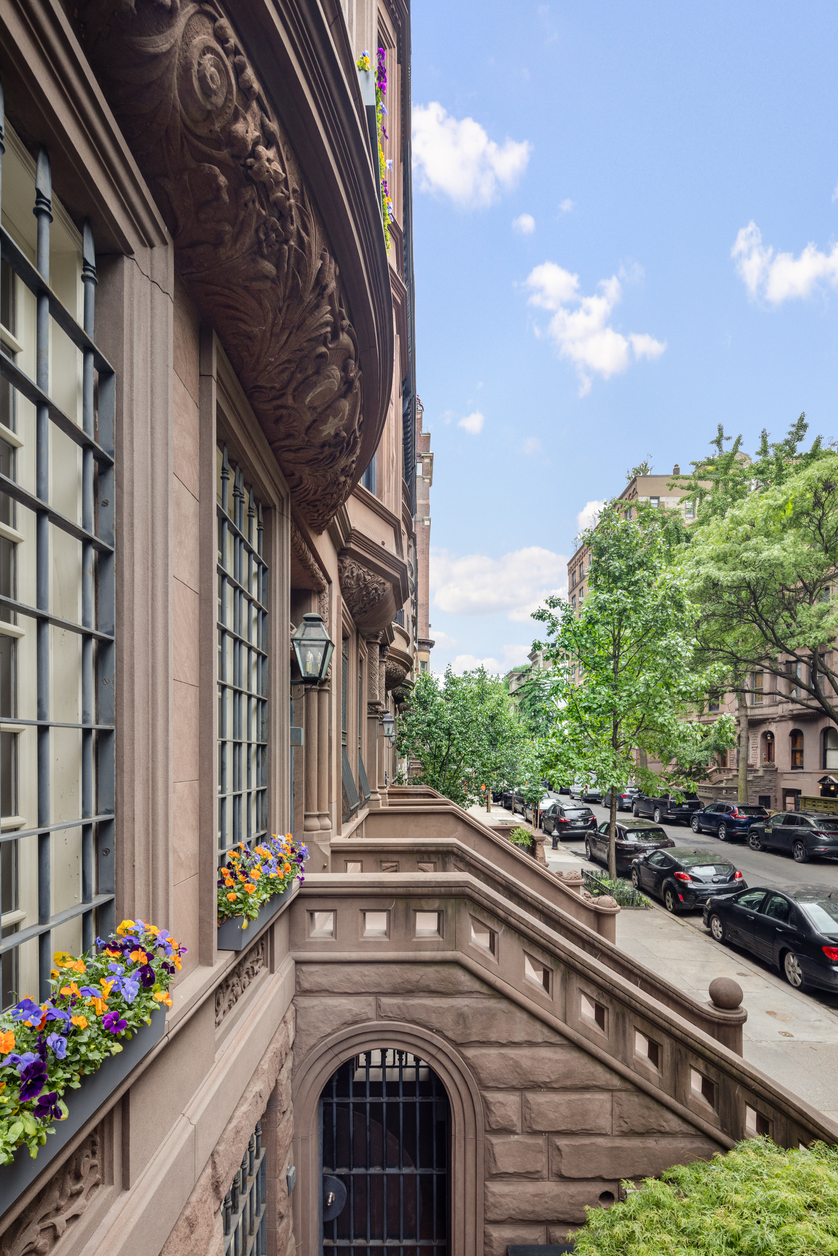 37 West 70th Street Manhattan, NY 10023 - Photo 3 of 41 a view of a house with a flower garden