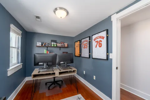 a workspace with furniture and window