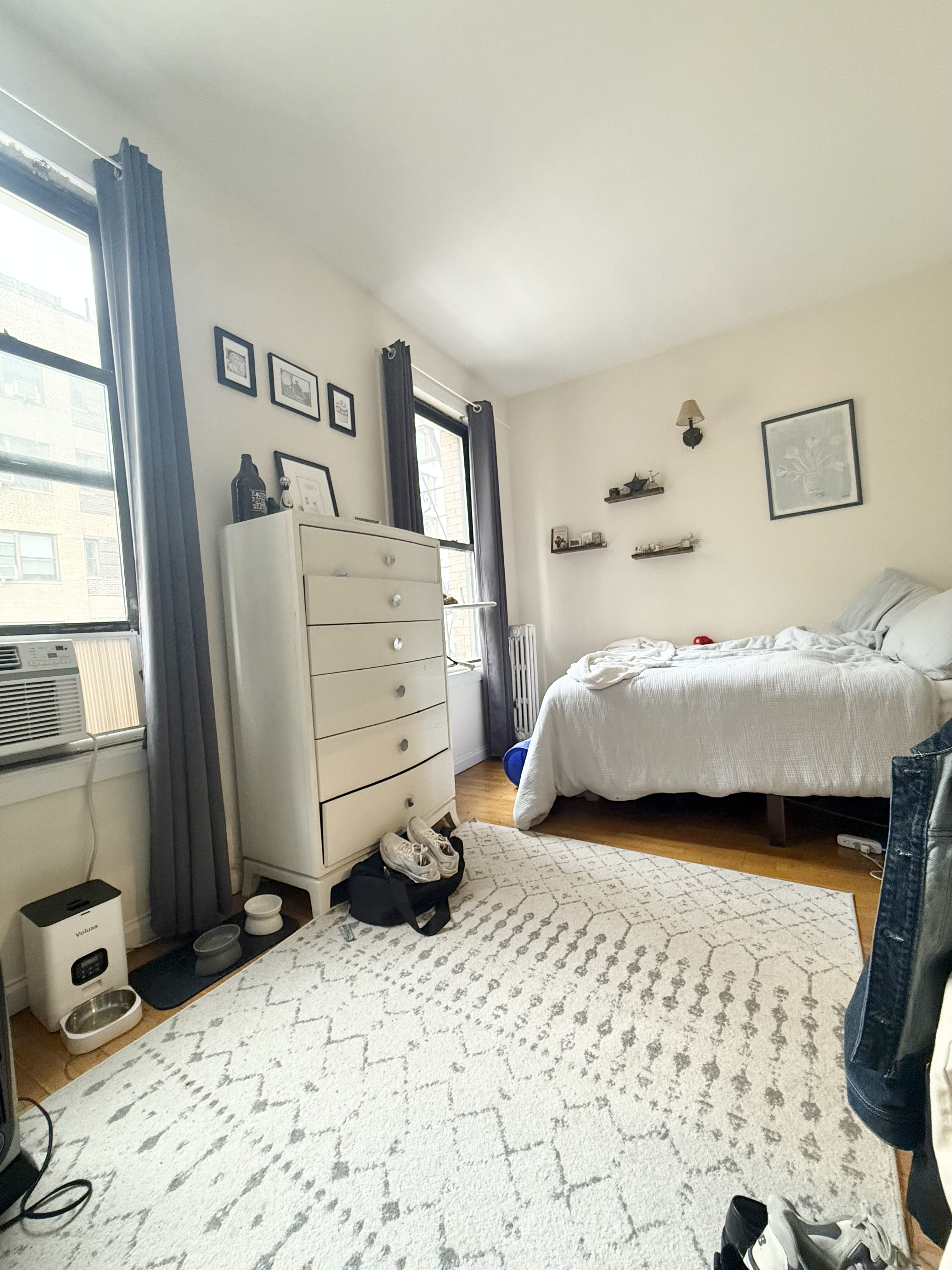 205 West 103rd Street, Unit 3A Manhattan, NY 10025 - Photo 4 of 9 a bedroom with a bed and a window