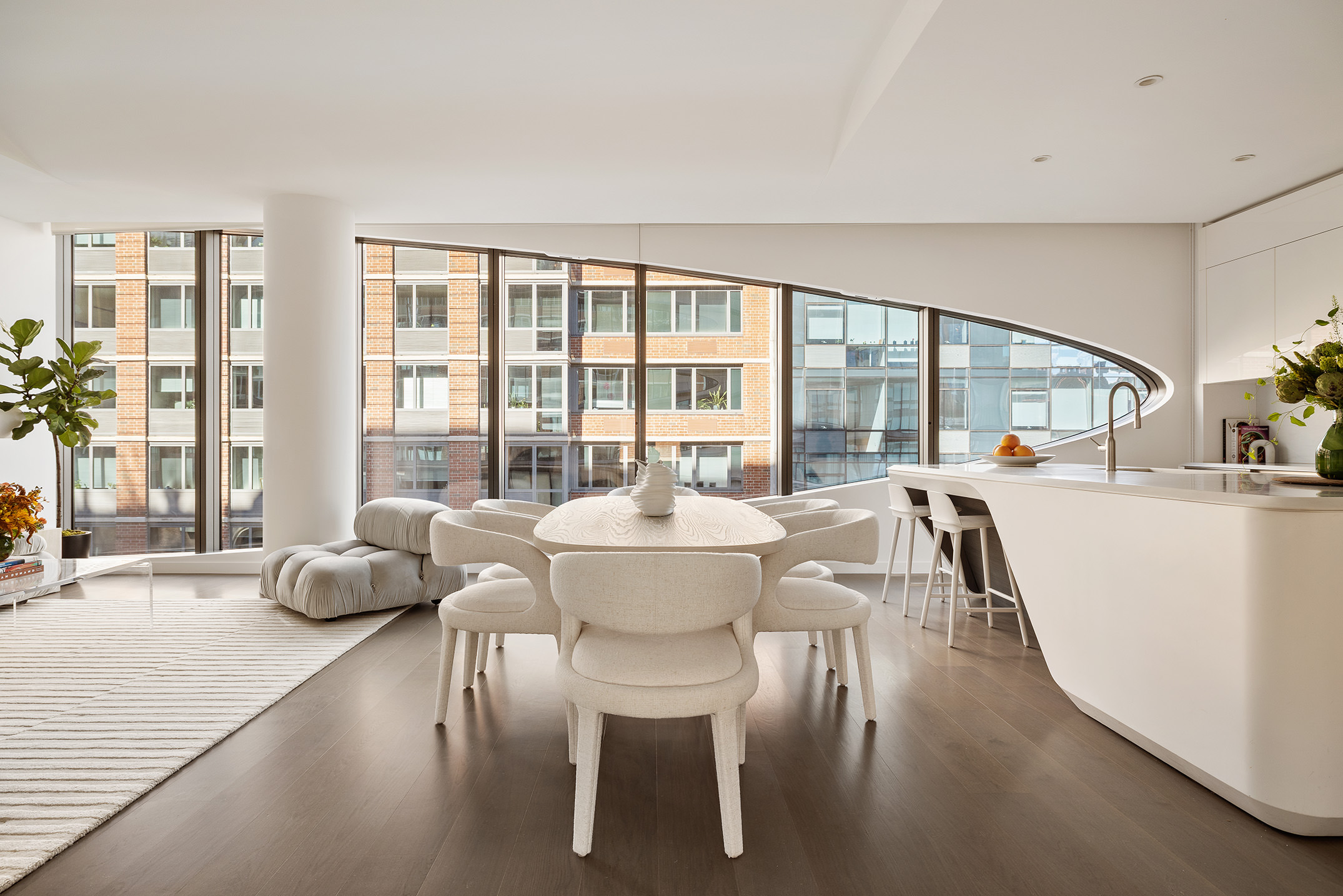 520 West 28th Street, Unit 18 Manhattan, NY 10001 - Photo 5 of 21 a dining room with furniture a chandelier and wooden floor